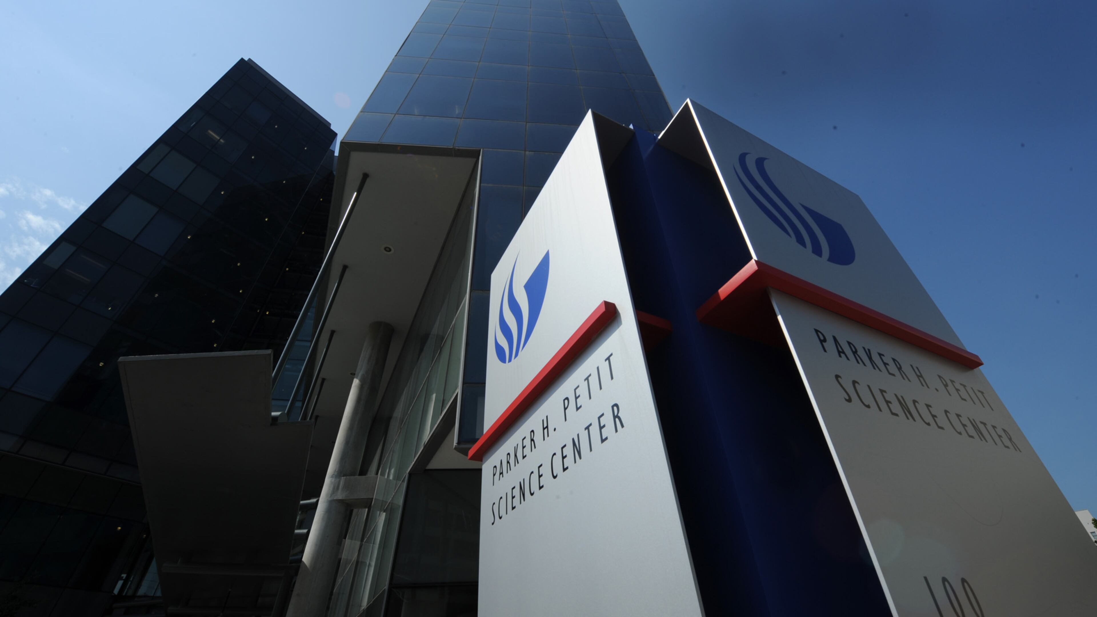 The shooting occurred inside Georgia State University's Parker H. Petit Science Center, school police said. The officer was alert when he was taken to Grady Memorial Hospital.