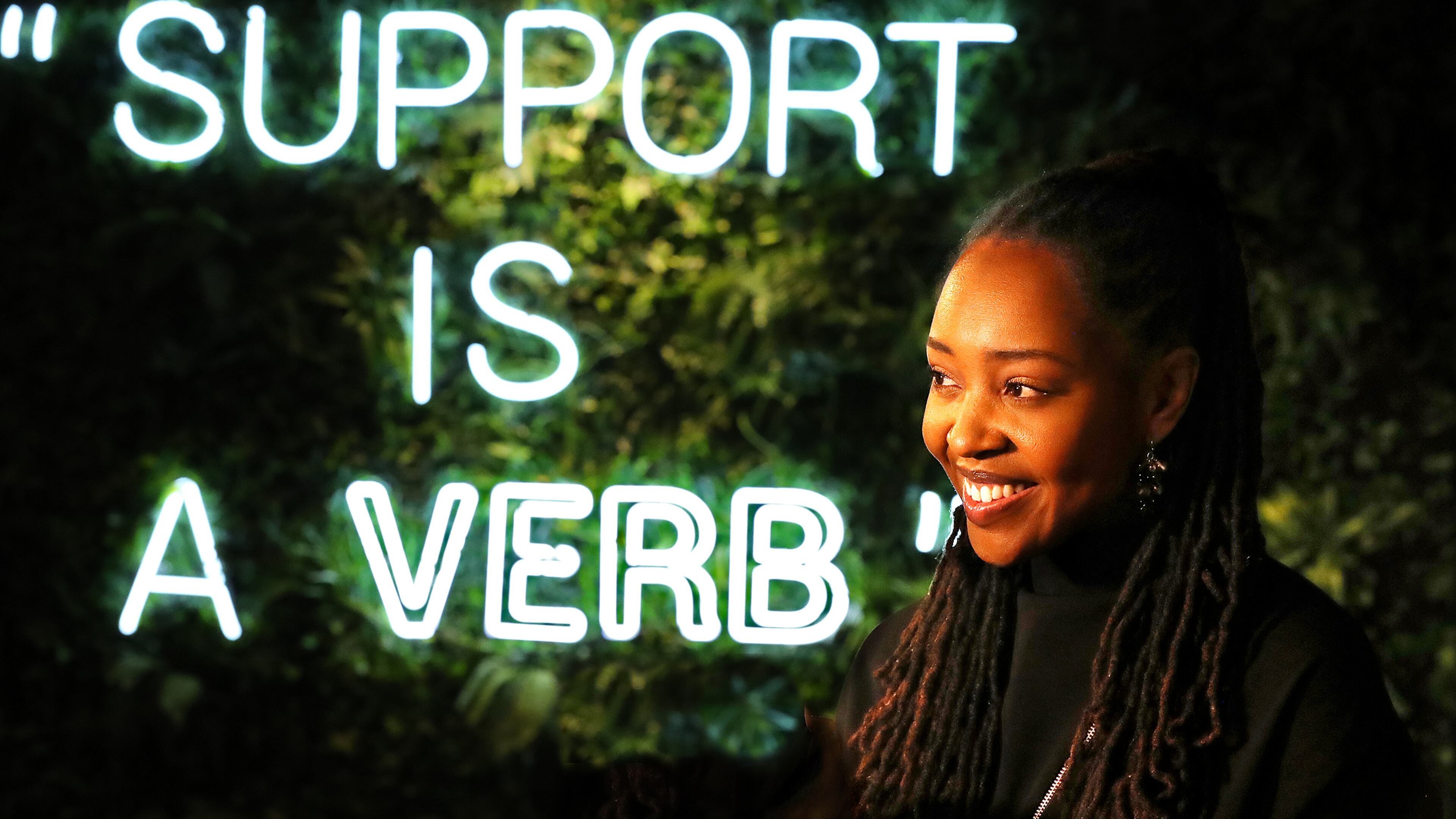 Owner Lakeysha Hallmon discusses the concept of her store The Village at Ponce City Market with a large tag line to the community prominently displayed on one of the main walls on Monday, Nov 23, 2020, in Atlanta. “Curtis Compton / Curtis.Compton@ajc.com”