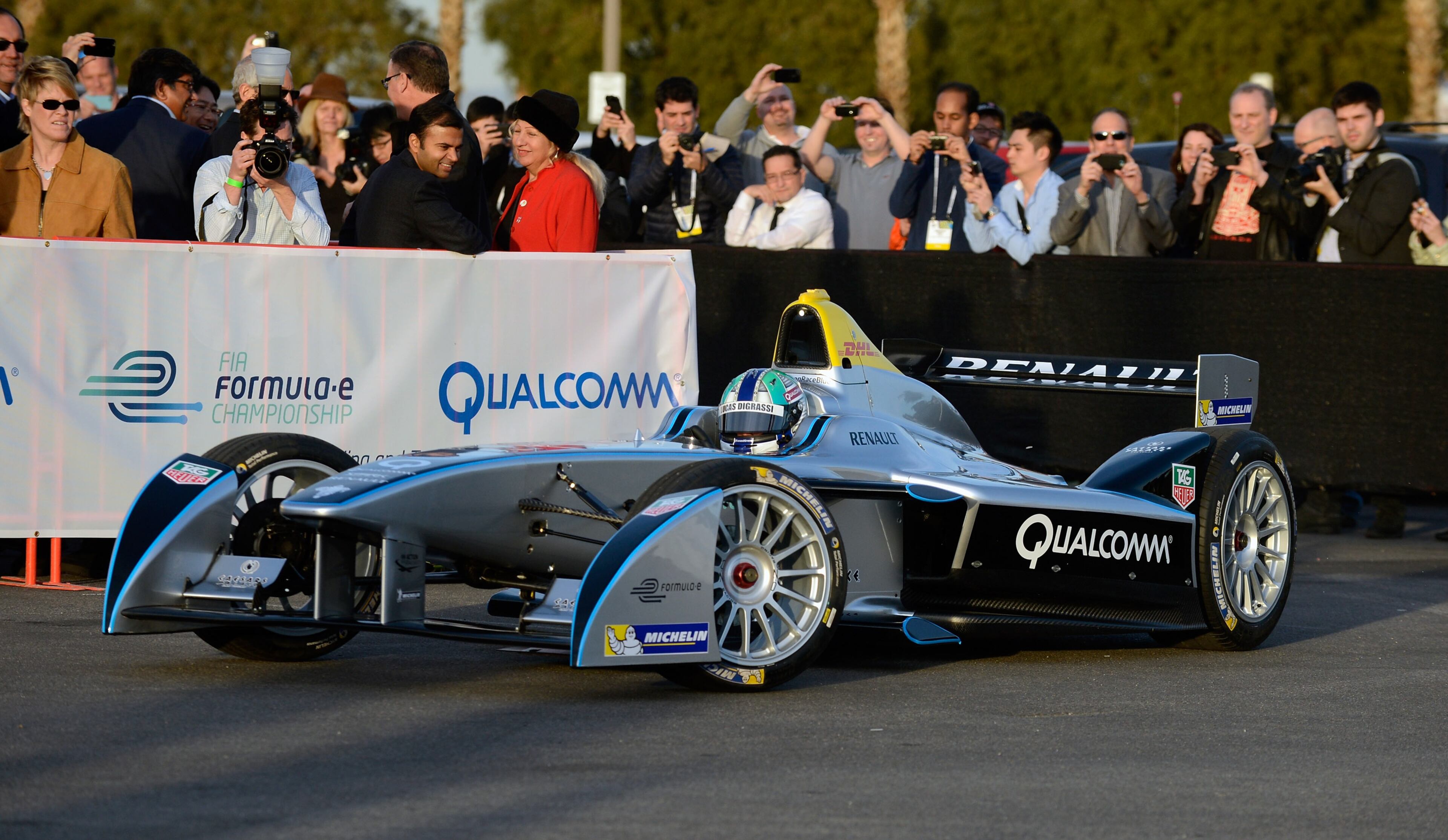 LAS VEGAS, NV - JANUARY 06: Race car driver Lucas di Grassi demonstrates Formula Es new fully-electric race car, the Spark-Renault SRT_01E during a press event at the Mandalay Bay Convention Center for the 2014 International CES on January 6, 2014 in Las Vegas, Nevada. CES, the world's largest annual consumer technology trade show, runs from January 7-10 and is expected to feature 3,200 exhibitors showing off their latest products and services to about 150,000 attendees. (Photo by David Becker/Getty Images)