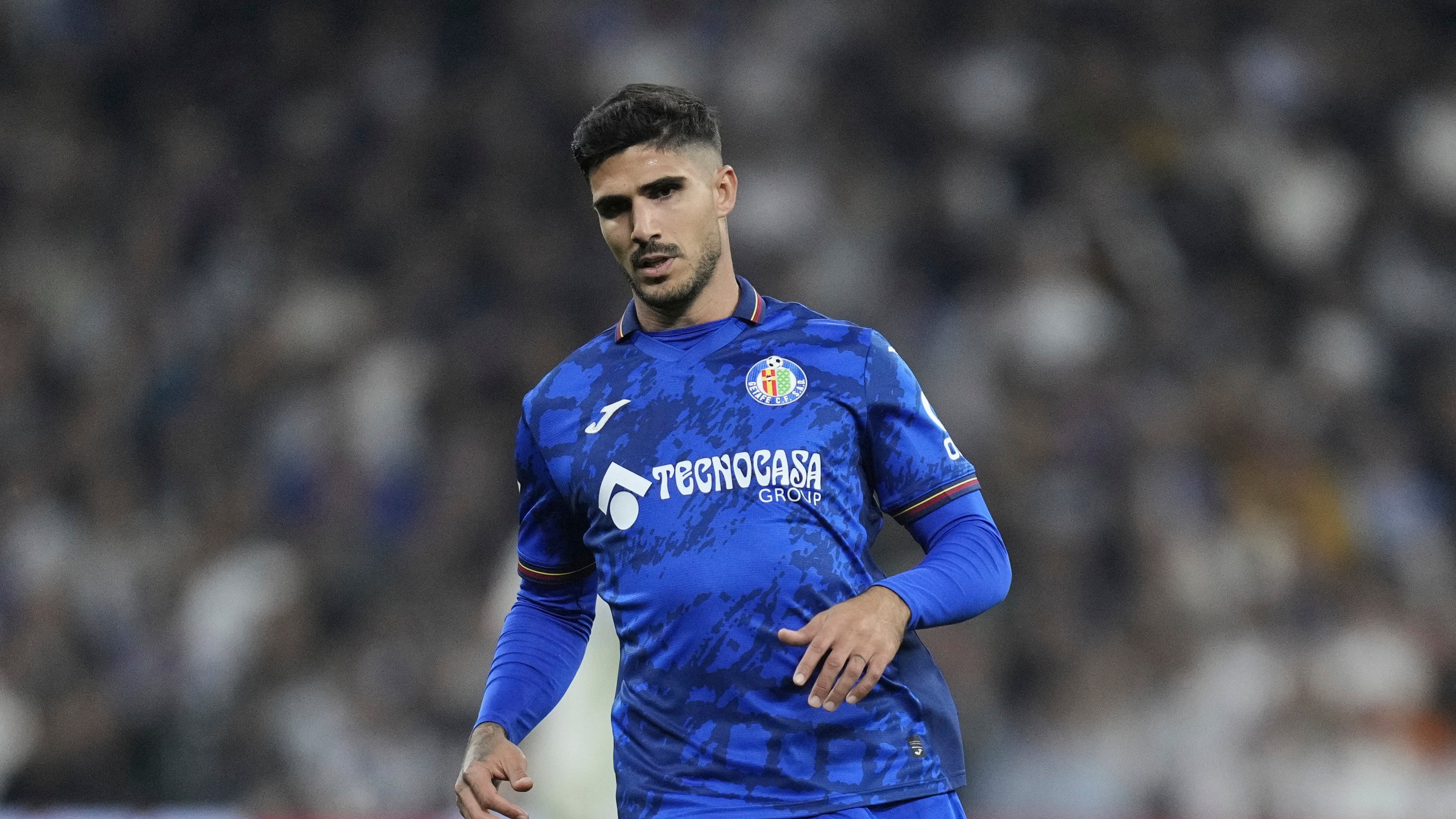 Getafe's Juan Berrocal during the Spanish La Liga soccer match between Real Madrid and Getafe at the Santiago Bernabeu Stadium in Madrid, Spain, Sunday, Dec. 1, 2024. (AP Photo/Bernat Armangue)