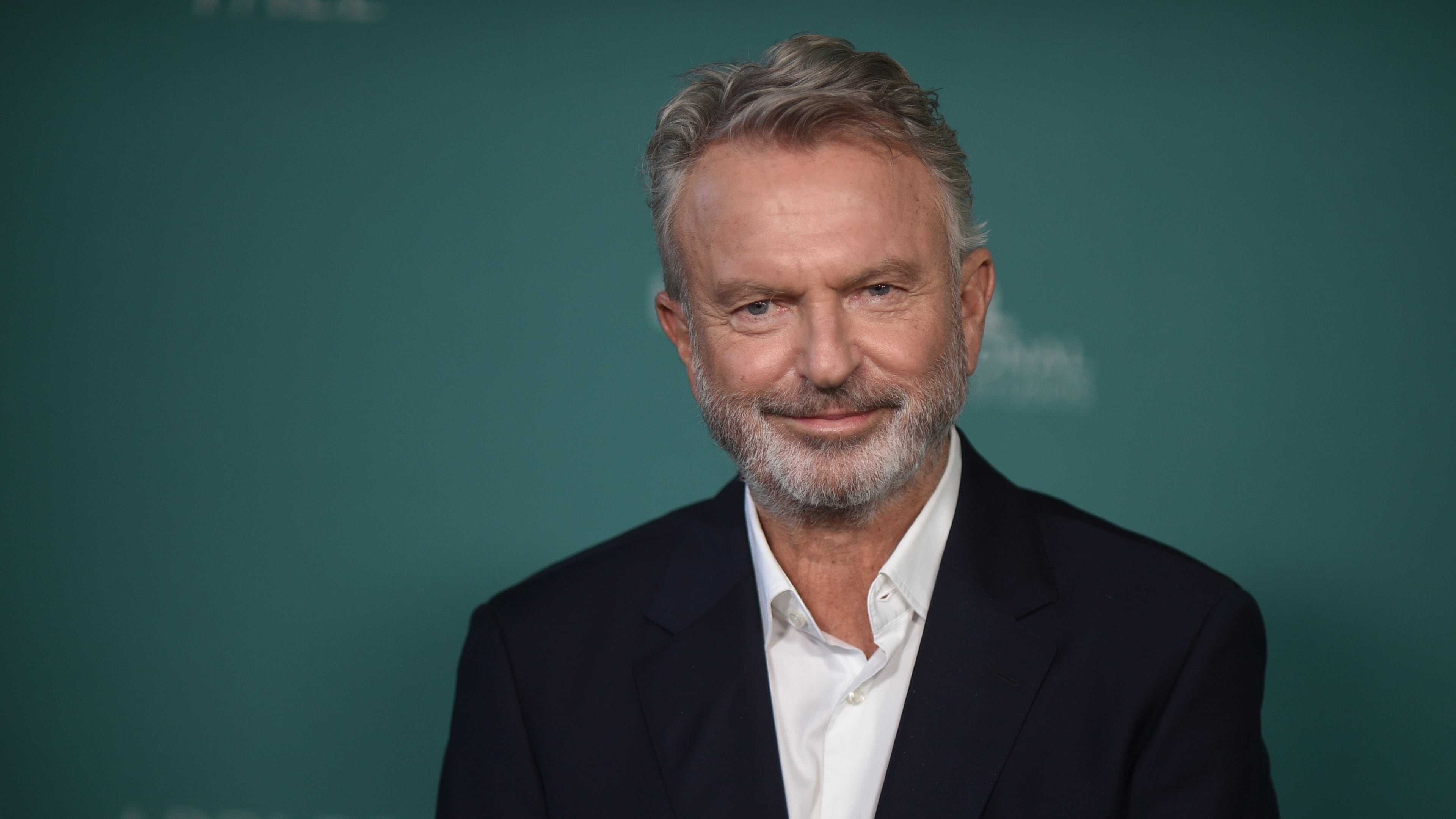 FILE - Sam Neill arrives at the premiere of "Apples Never Fall" on March 12, 2024, in Los Angeles. (Photo by Richard Shotwell/Invision/AP, File)