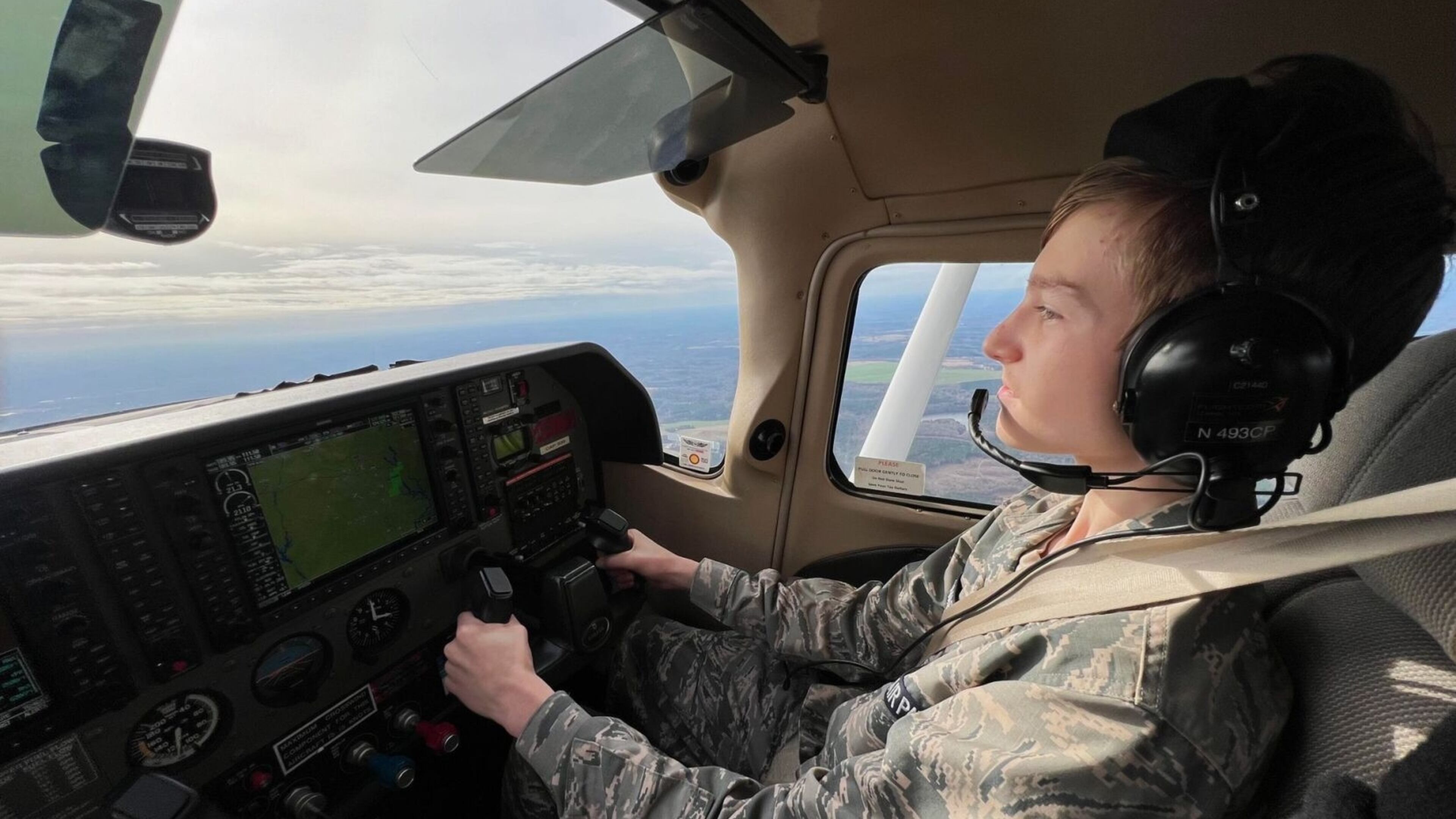 Cadet Airman Evan Howard on his orientation flight with the Morgan County Civil Air Patrol program. (Courtesy of Civil Air Patrol)