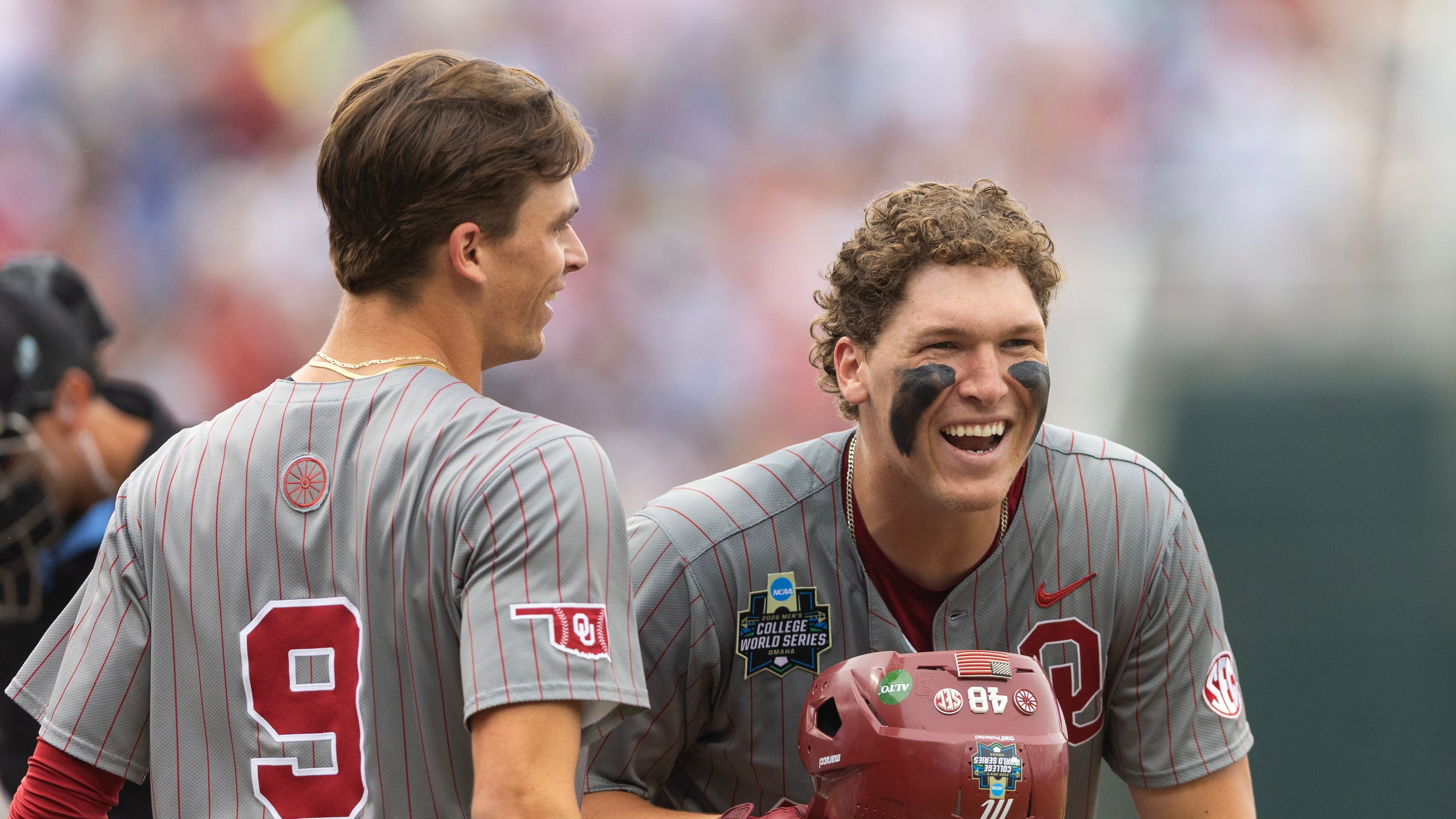 Oklahoma's Deiten Lachance, right, celebrates with Camden Johnson after hitting a two-run home run against North Carolina in the first inning of Game 1 of the NCAA College World Series baseball finals in Omaha, Neb., Saturday, June 20, 2026. (AP Photo/Rebecca S. Gratz)
