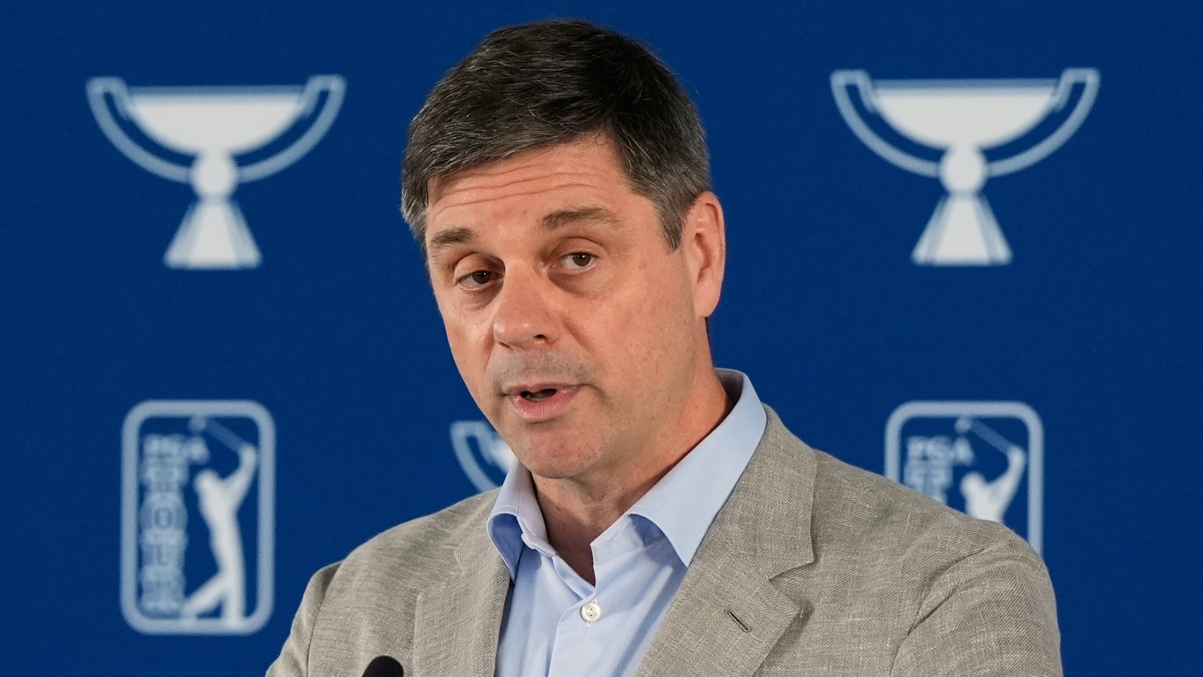 FILE - PGA Tour CEO Brian Rolapp speaks before a practice round of the Tour Championship golf tournament, Aug. 20, 2025, in Atlanta. (AP Photo/Mike Stewart, File)