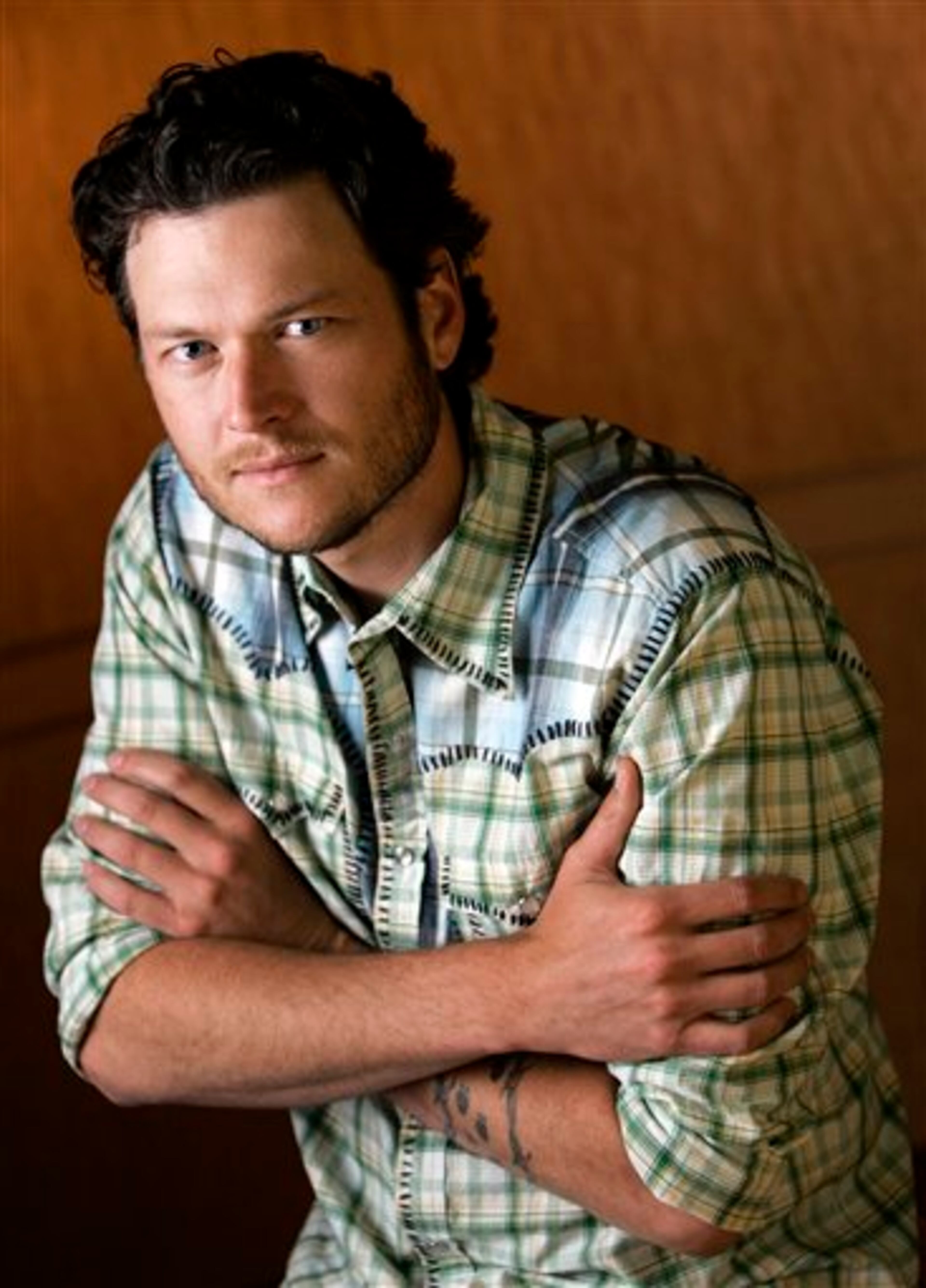 Country singer Blake Shelton is shown April 18, 2007 in Nashville, Tenn. If Shelton comes across as a little gloomy on his new album "Pure BS," he has good reason. He was going through a divorce when he was making it, and he says he had a lot on his mind. Eight of the 11 songs deal with relationships gone wrong, from the guy trying desperately to hold onto his girl in "Don't Make Me" to the one who runs into his ex- and her new beau in "I Don't Care." (AP Photo/Mark Humphrey)