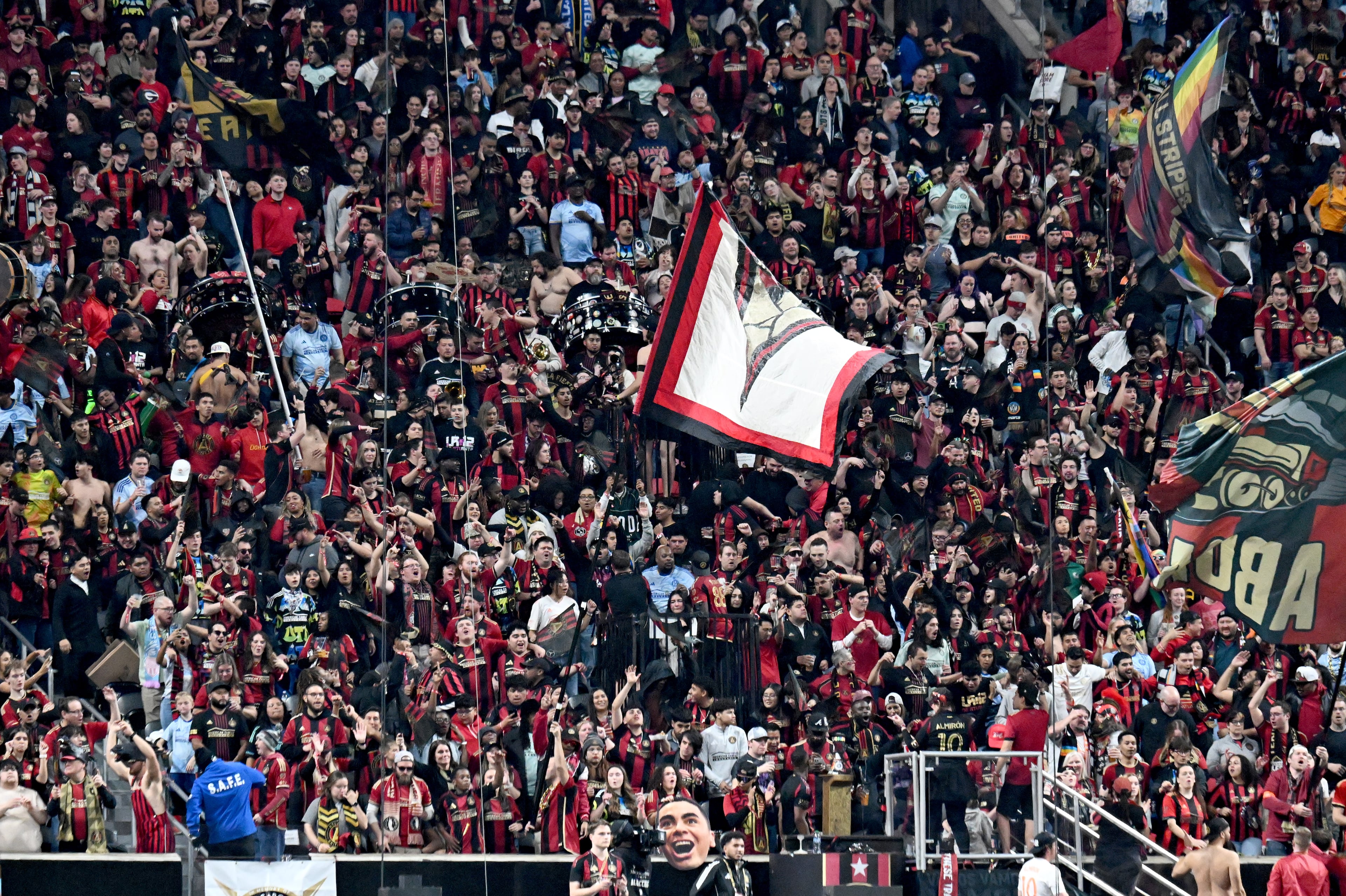 Atlanta United fans cheer during the second half of Atlanta United’s MLS season opener at Mercedes-Benz Stadium, Saturday, February 22, 2025, in Atlanta. Atlanta United won 3-2 over CF Montreal. (Hyosub Shin / AJC)