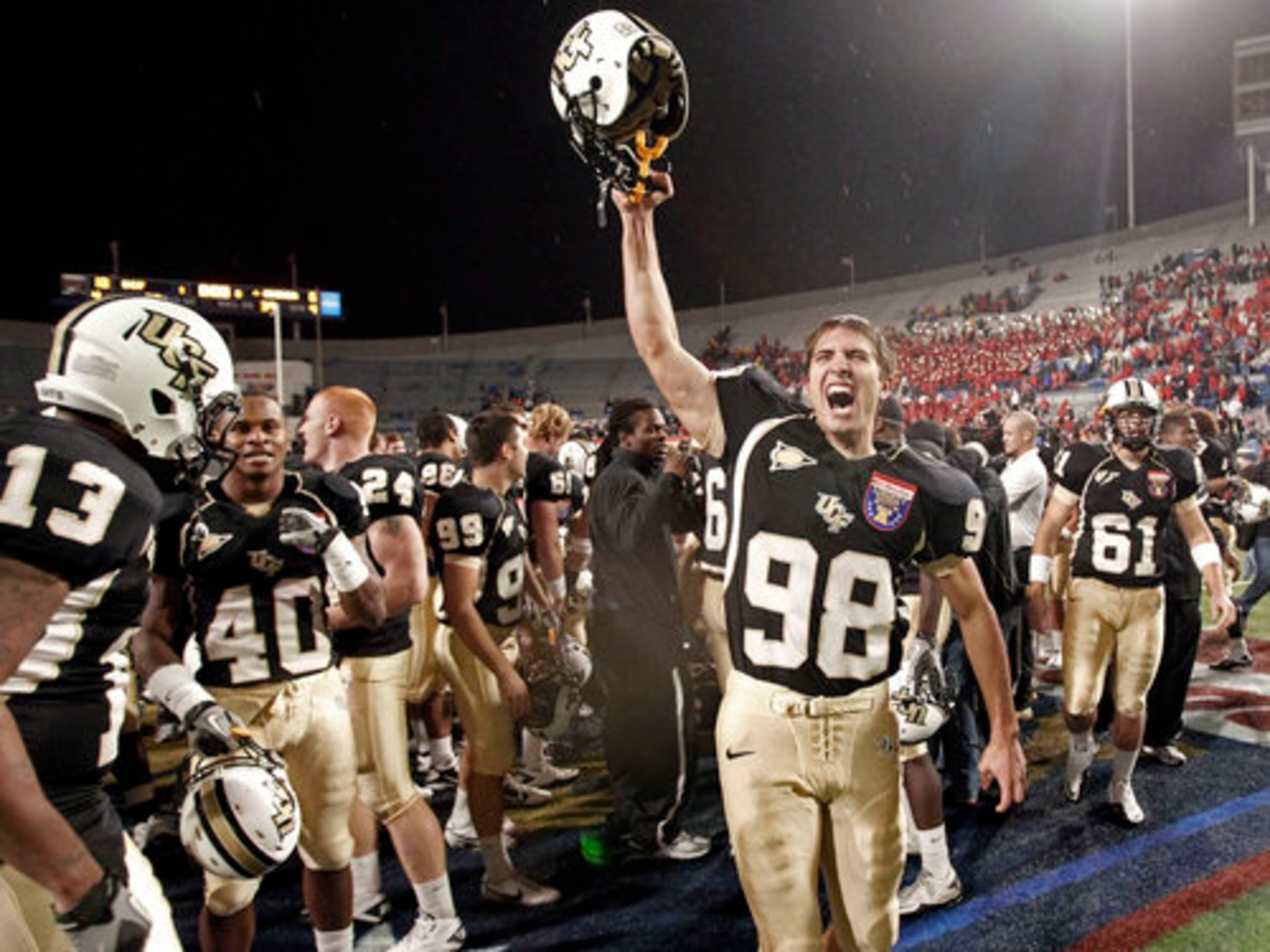 Central Florida punter David Bohner (98) celebrates after Central Florida defeated Georgia 10-6 in the Liberty Bowl NCAA college football game Friday, Dec. 31, 2010, in Memphis, Tenn.