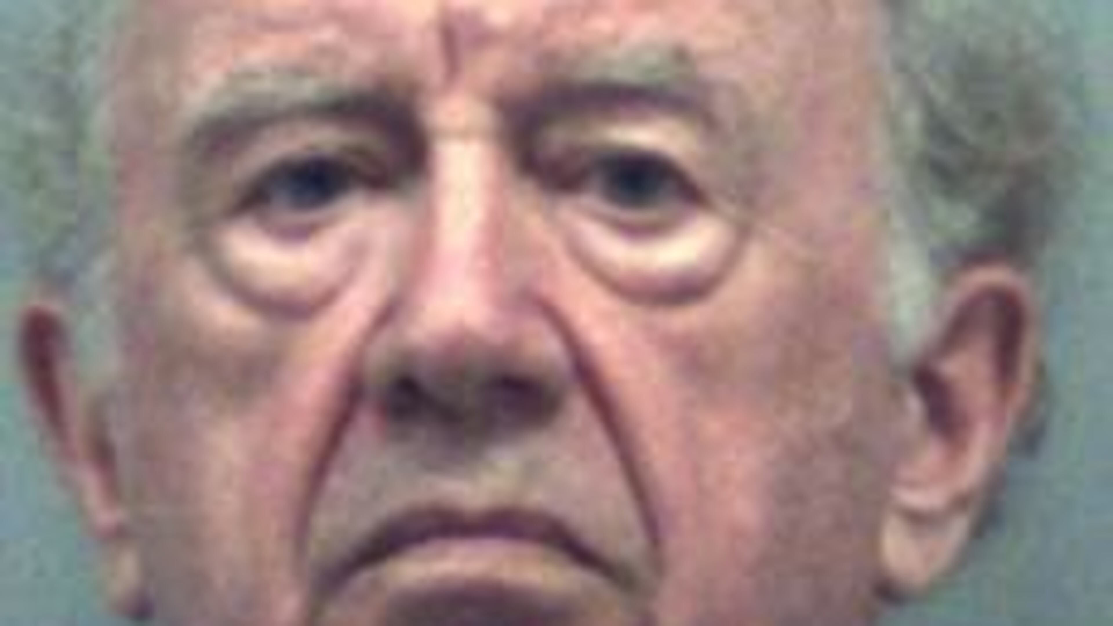 Bruce Christie, 74, was arrested Tuesday and charged with impersonating a police officer. (Credit: Gwinnett County Police Department)