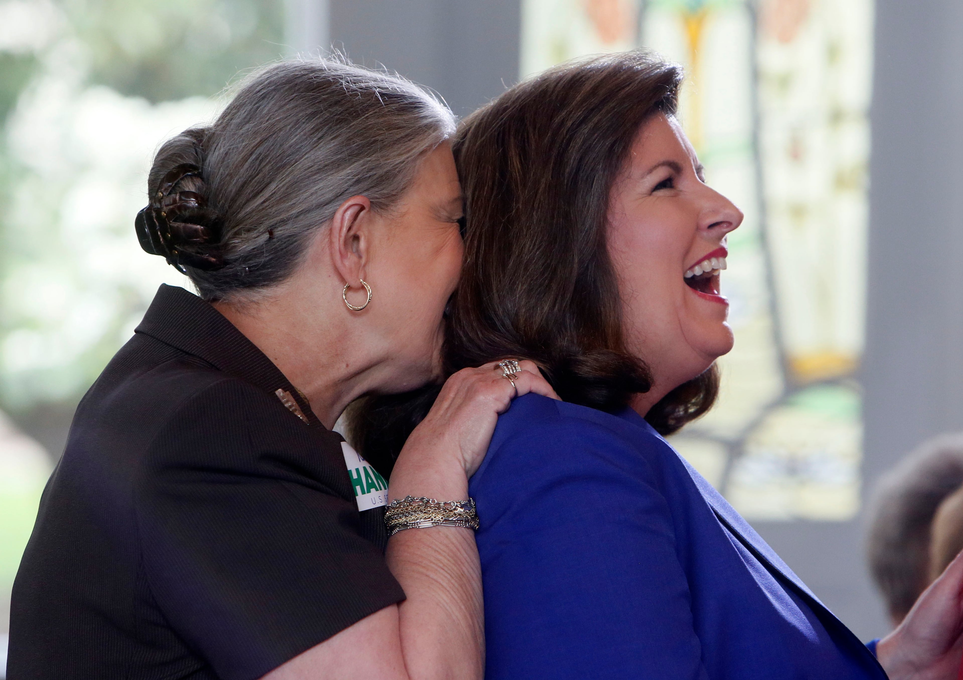 Bette Rose Bowers (left) with Karen Handel as Handel mingled with the group before the event. Former VP contender Sarah Palin made a surprise appearance at an event for Senate candidate Karen Handel, who is seeking traction in the crowded GOP contest. Palin campaigned for Handel at at the South Fulton Republican Women's monthly meeting. BOB ANDRES / BANDRES@AJC.COM