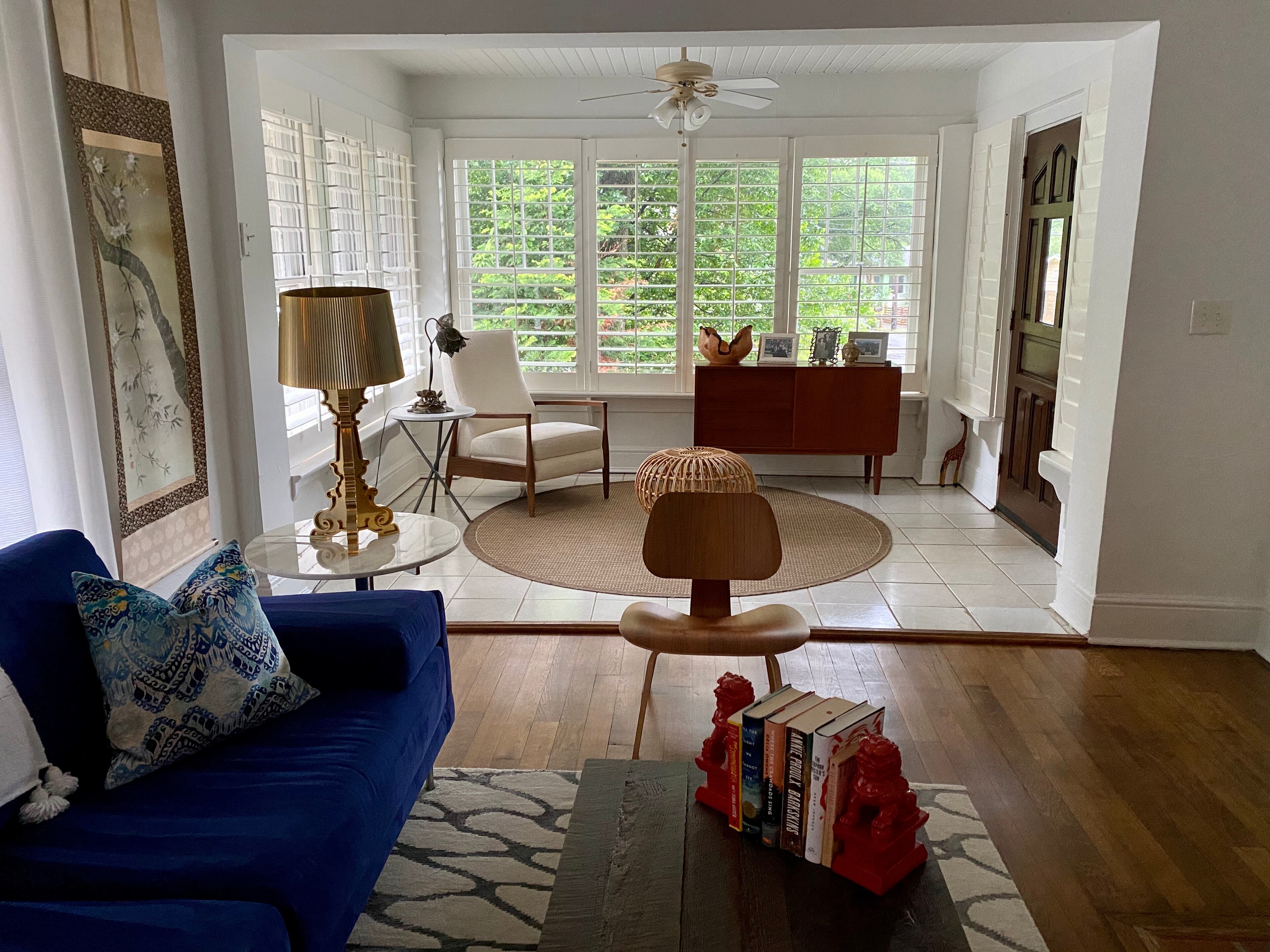 In the Kirkwood neighborhood in Atlanta, Alison Weidner enjoys her sunroom by starting each day with reading a book with a cup of coffee. The inspiration for the design is midcentury modern meets Scandanavian minimalism.