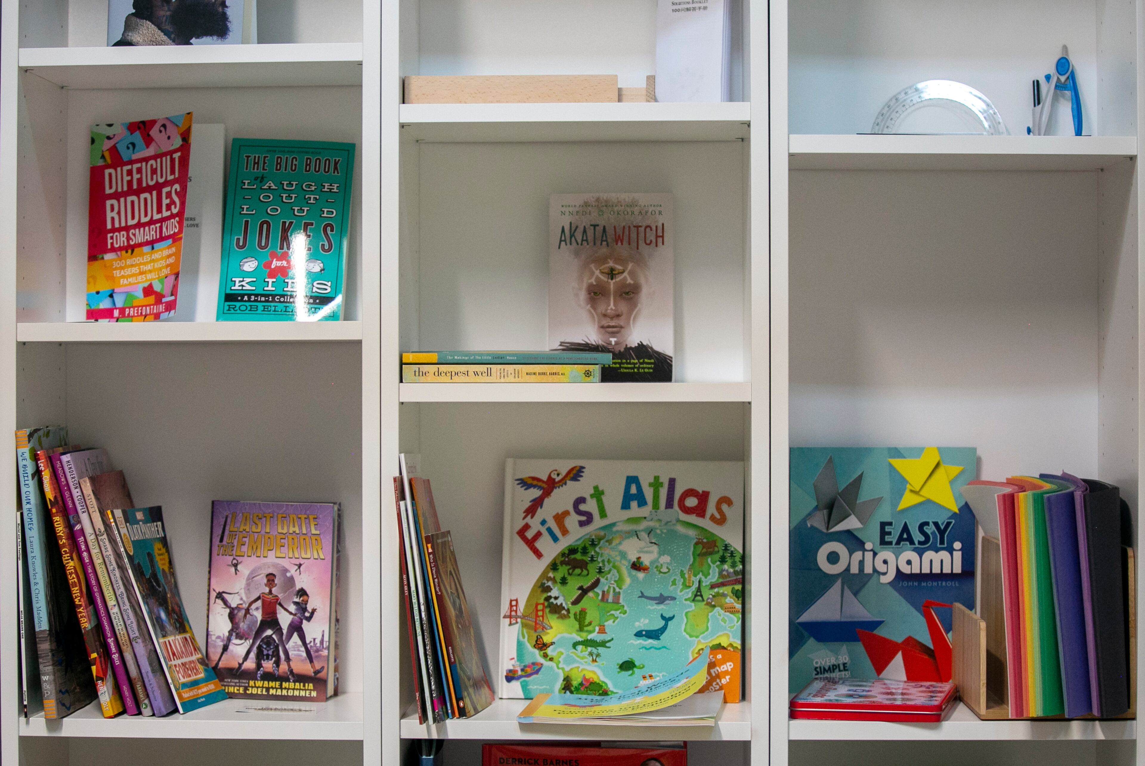 Children’s books are seen on shelves at Makeisha Robey’s space The Happy Black Parent in the Nia Building at Pittsburgh Yards, a professional and maker space near Adair Park, Capitol Gateway, Mechanicsville, Peoplestown, Pittsburgh and Summerhill neighborhoods in southwest Atlanta on Tuesday, September 7, 2021. (Rebecca Wright for the Atlanta Journal-Constitution)