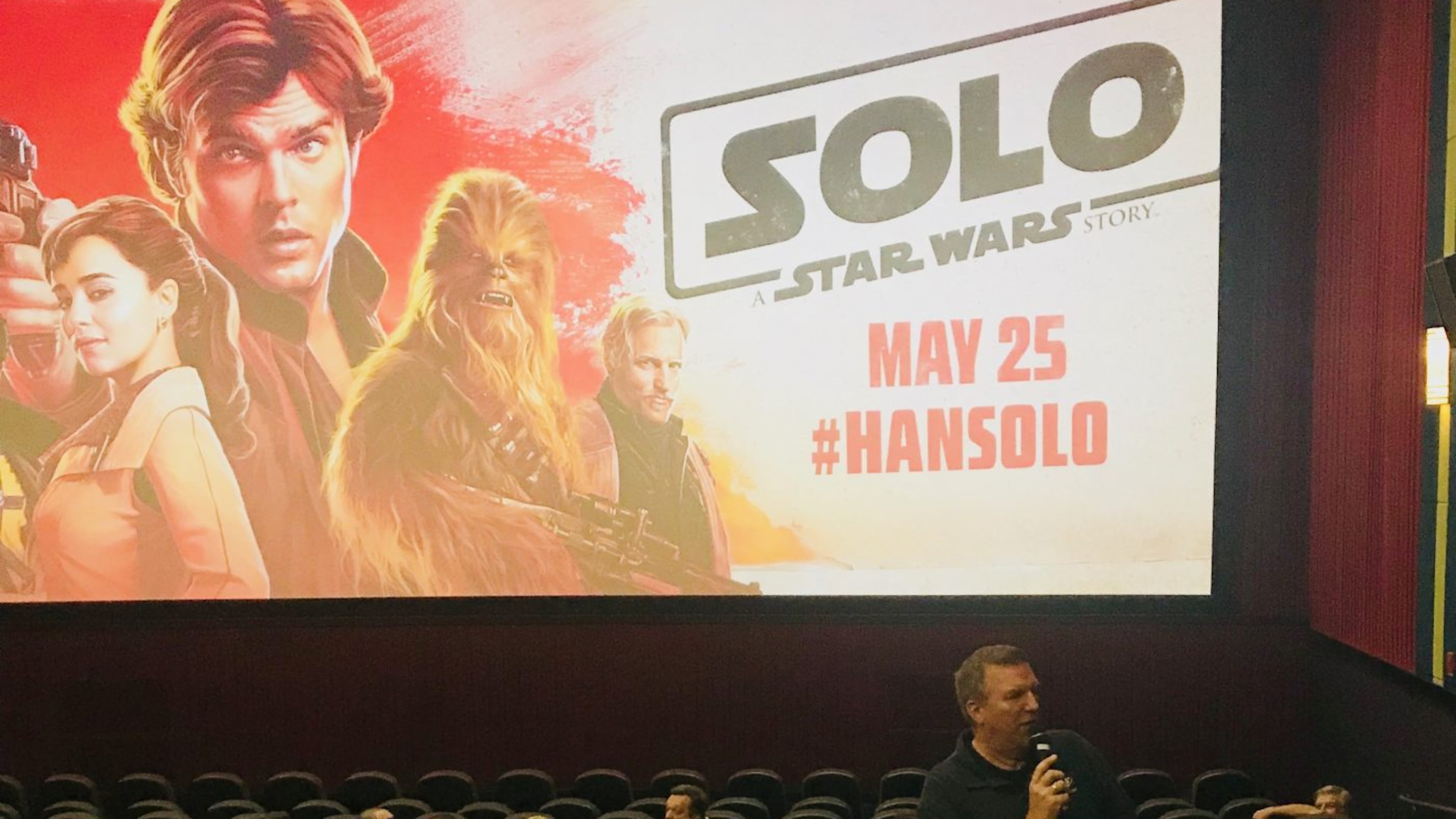 Steve Craig, morning host for 97.1 The River, handed out T-shirts and quizzed fans before Monday's advanced screening. CREDIT: Stephanie Toone