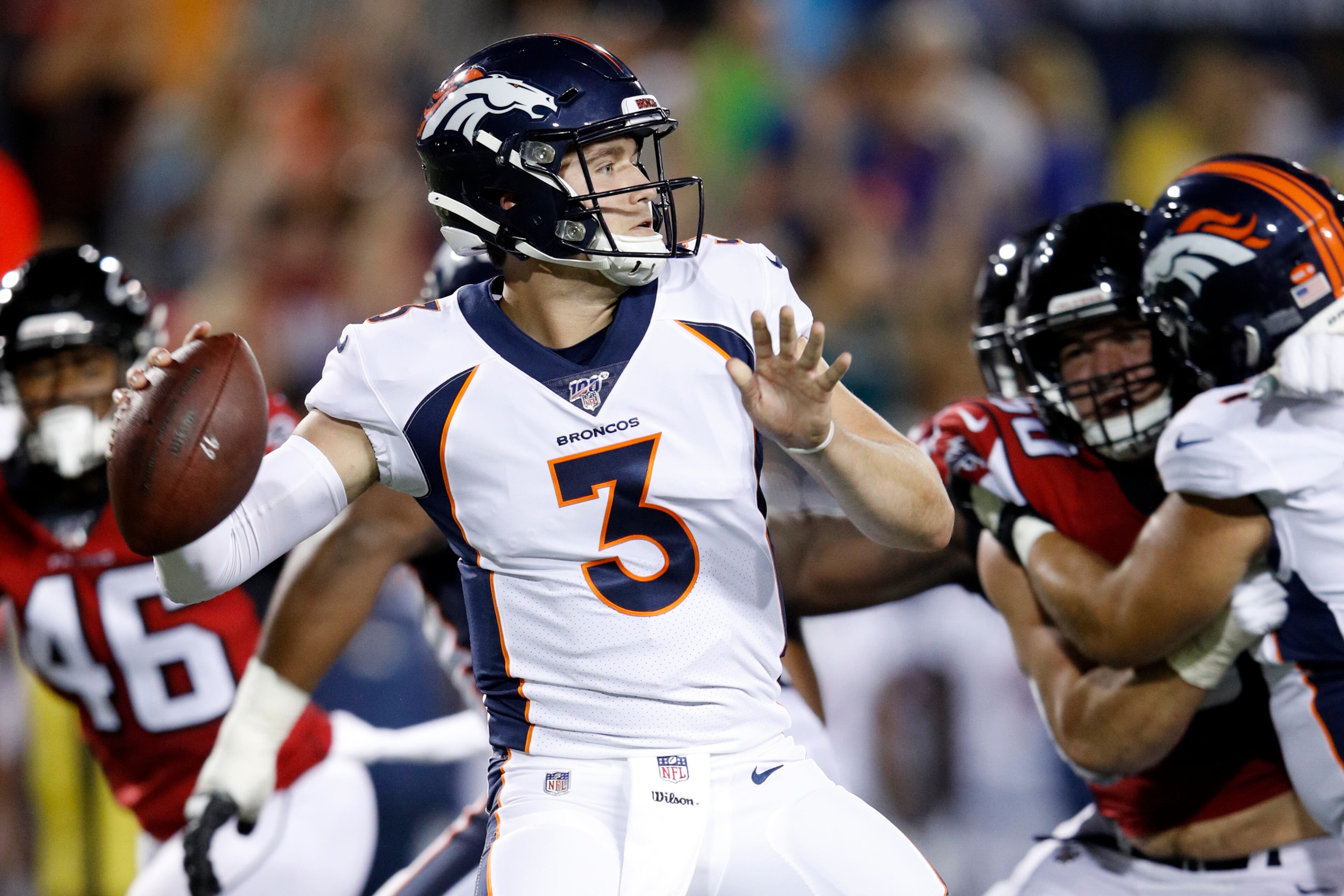 Drew Lock #3 of the Denver Broncos throws a pass in the first half of a preseason game against the Atlanta Falcons at Tom Benson Hall Of Fame Stadium on August 1, 2019 in Canton, Ohio. (Photo by Joe Robbins/Getty Images)