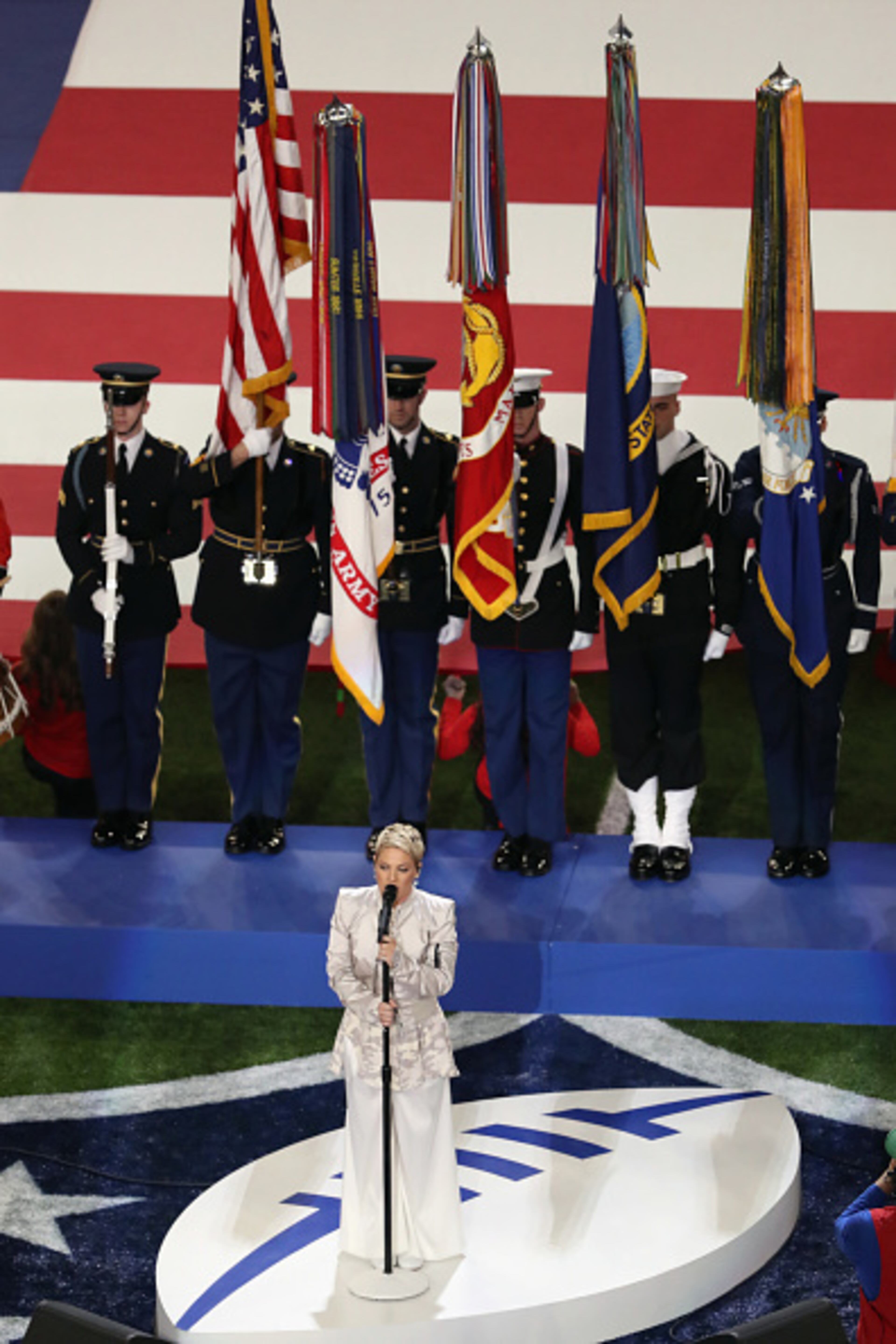MINNEAPOLIS, MN - FEBRUARY 04: Pink sings the national anthem prior to Super Bowl LII between the New England Patriots and the Philadelphia Eagles at U.S. Bank Stadium on February 4, 2018 in Minneapolis, Minnesota. (Photo by Christian Petersen/Getty Images)