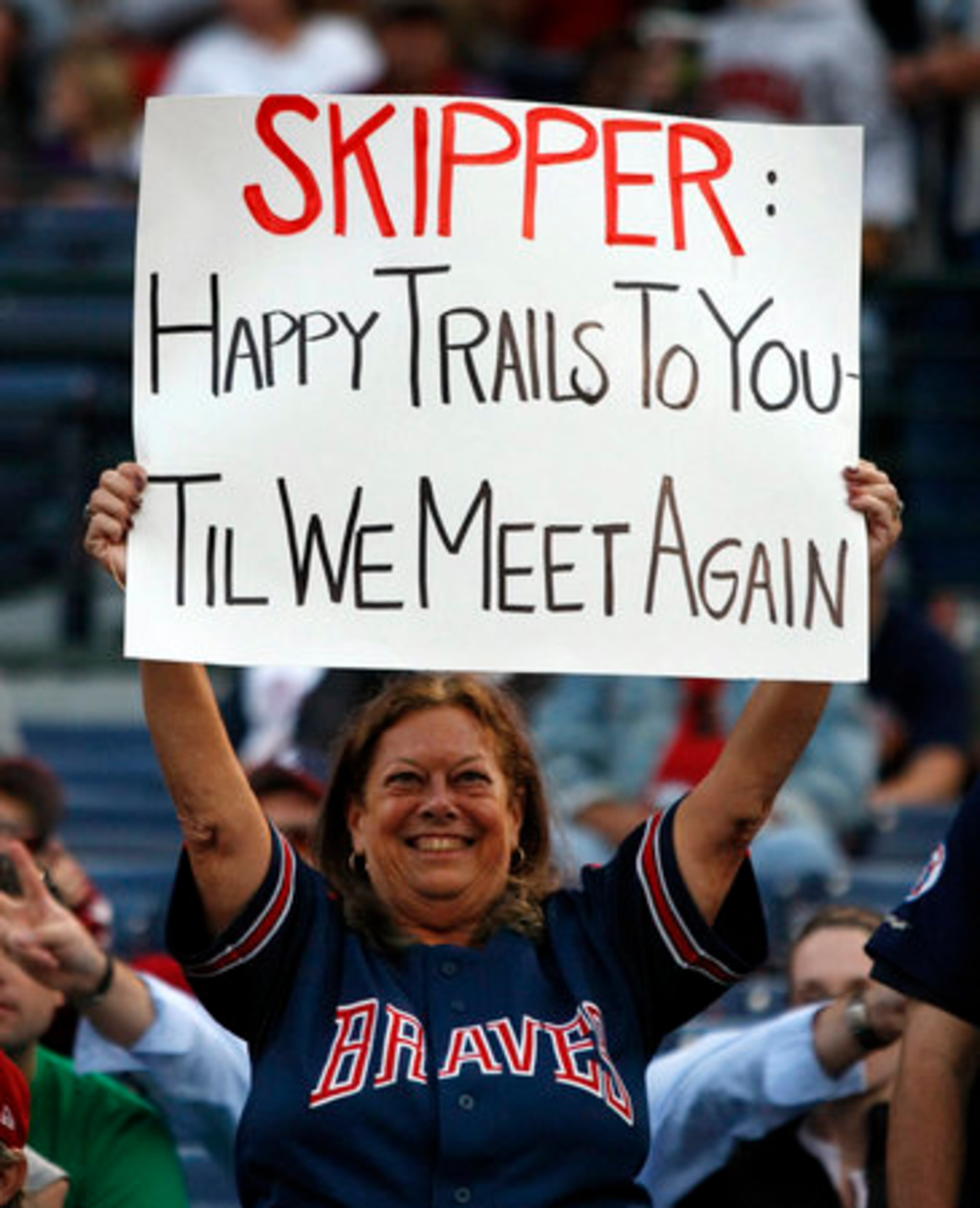 Braves fan Jean Renard, Carrabelle, FL, shows her support for Bobby Cox against the Phillies at Turner Field in Atlanta on Friday, Oct. 1, 2010. Renard lived in Woodstock for 20 years before moving to Florida.