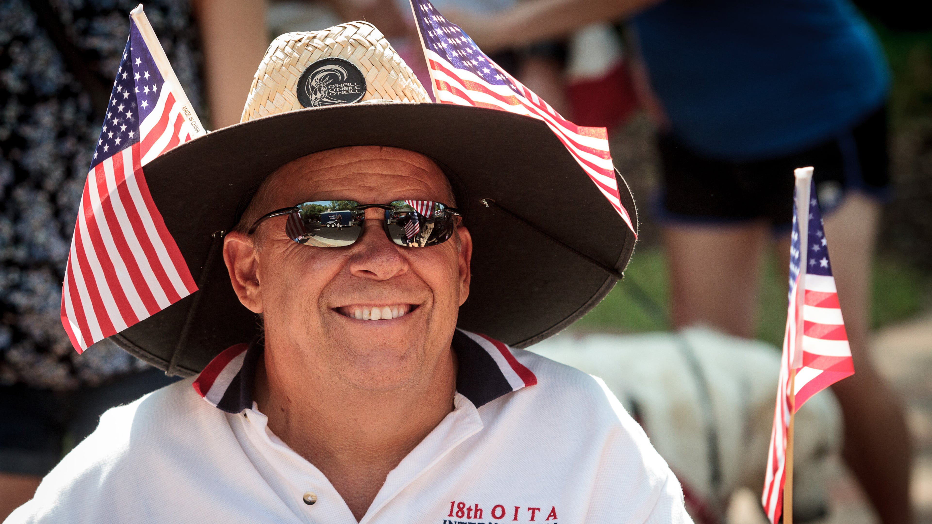 Jimbo Boyd shows his patriotism with his American flags as he watches the Old Soldiers Day Parade in Alpharetta, GA. Saturday, August 16, 2016. The parade honors the country’s war veterans and recognizes their service. STEVE SCHAEFER / SPECIAL TO THE AJC
