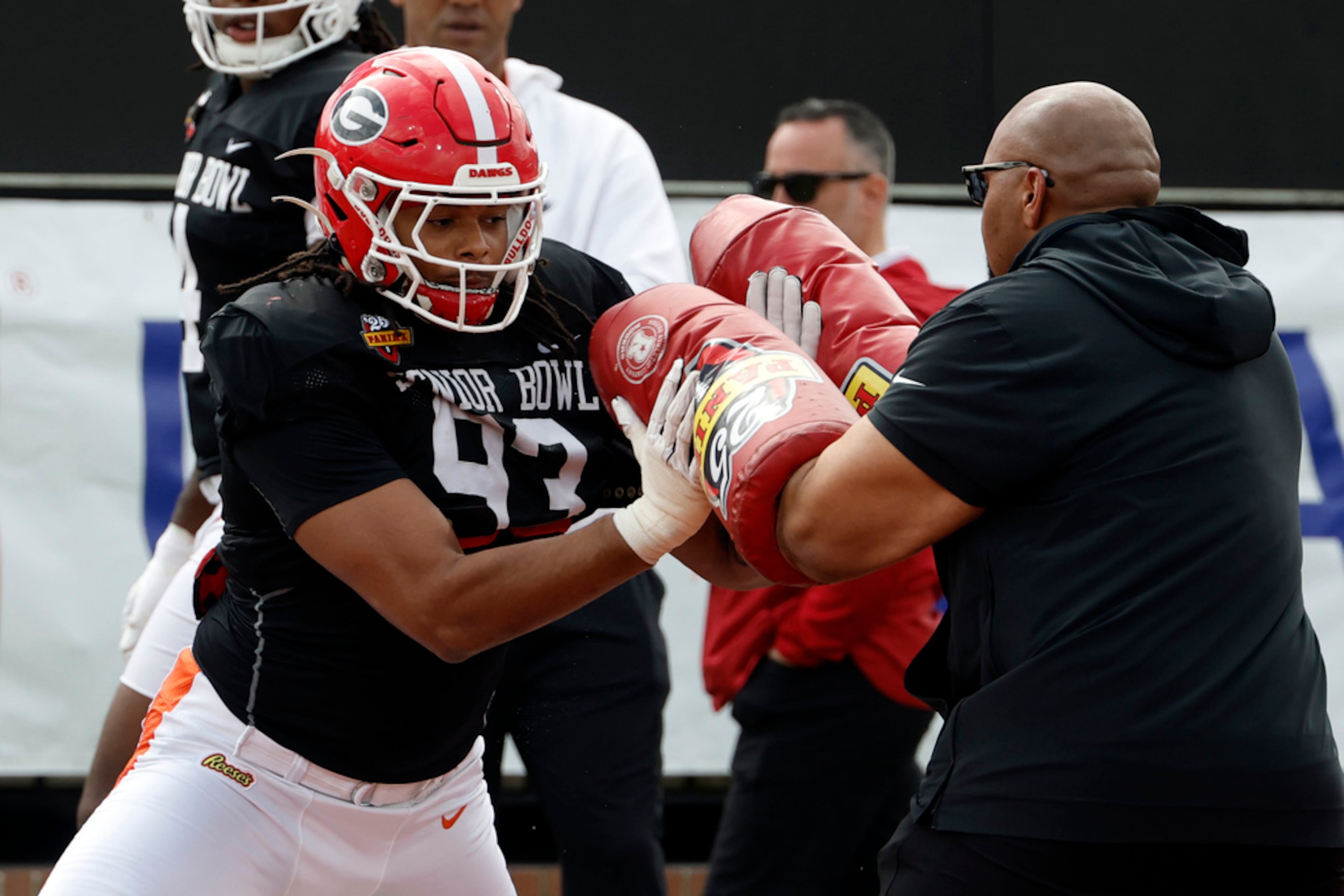 American team defensive lineman Tyrion Ingram-Dawkins of Georgia (93) runs through drills during practice for the Senior Bowl NCAA college football game, Thursday, Jan. 30, 2025, in Mobile, Ala. (AP Photo/Butch Dill)