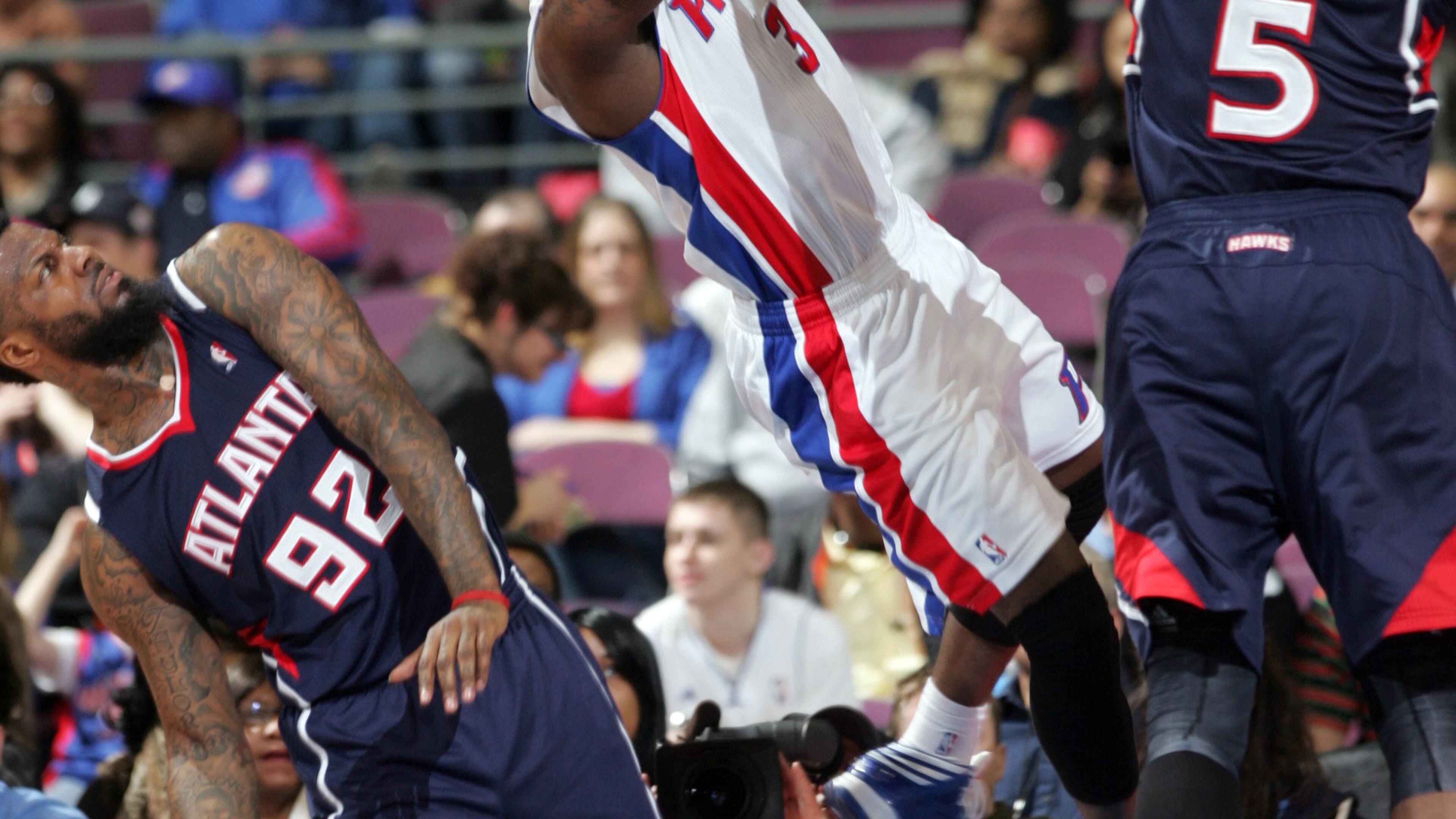 The Detroit Pistons' Rodney Stuckey drives against the Atlanta's Josh Smith during first-quarter action Monday at The Palace of Auburn Hills, Mich. The Hawks won 114-103.