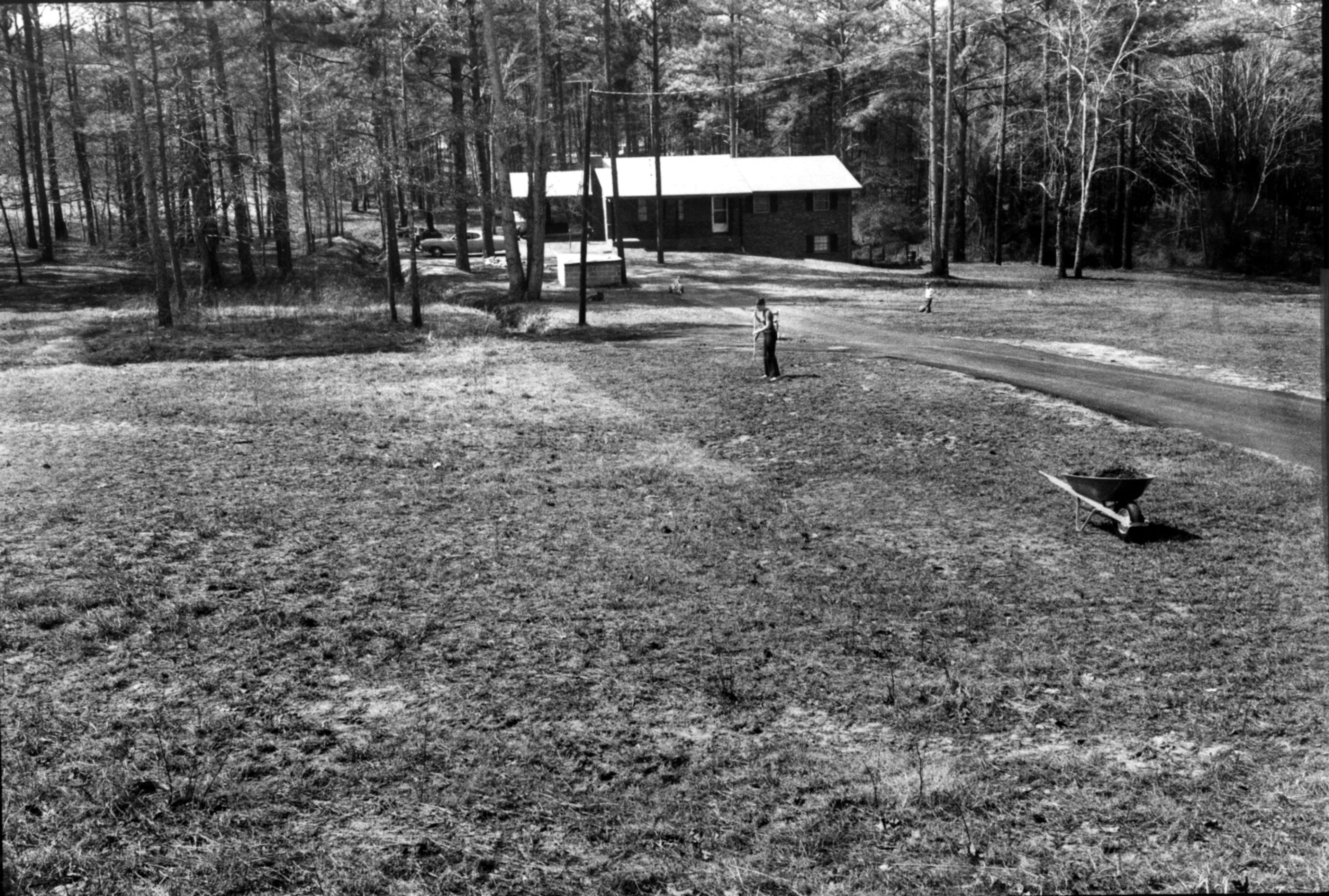 April 1978 -- Mrs. James Lamp, current owner of the Burkhalter home, works in the yard where Southern Airways Flight 242 ended its ill-fated flight in a pile of rubble in front of the former Burkhalter home off the Ga. 92 Spur in New Hope on April 4, 1977. Read the 1978 NTSB crash report (.PDF format) | Latest news on Malaysia Airlines Flight 370
