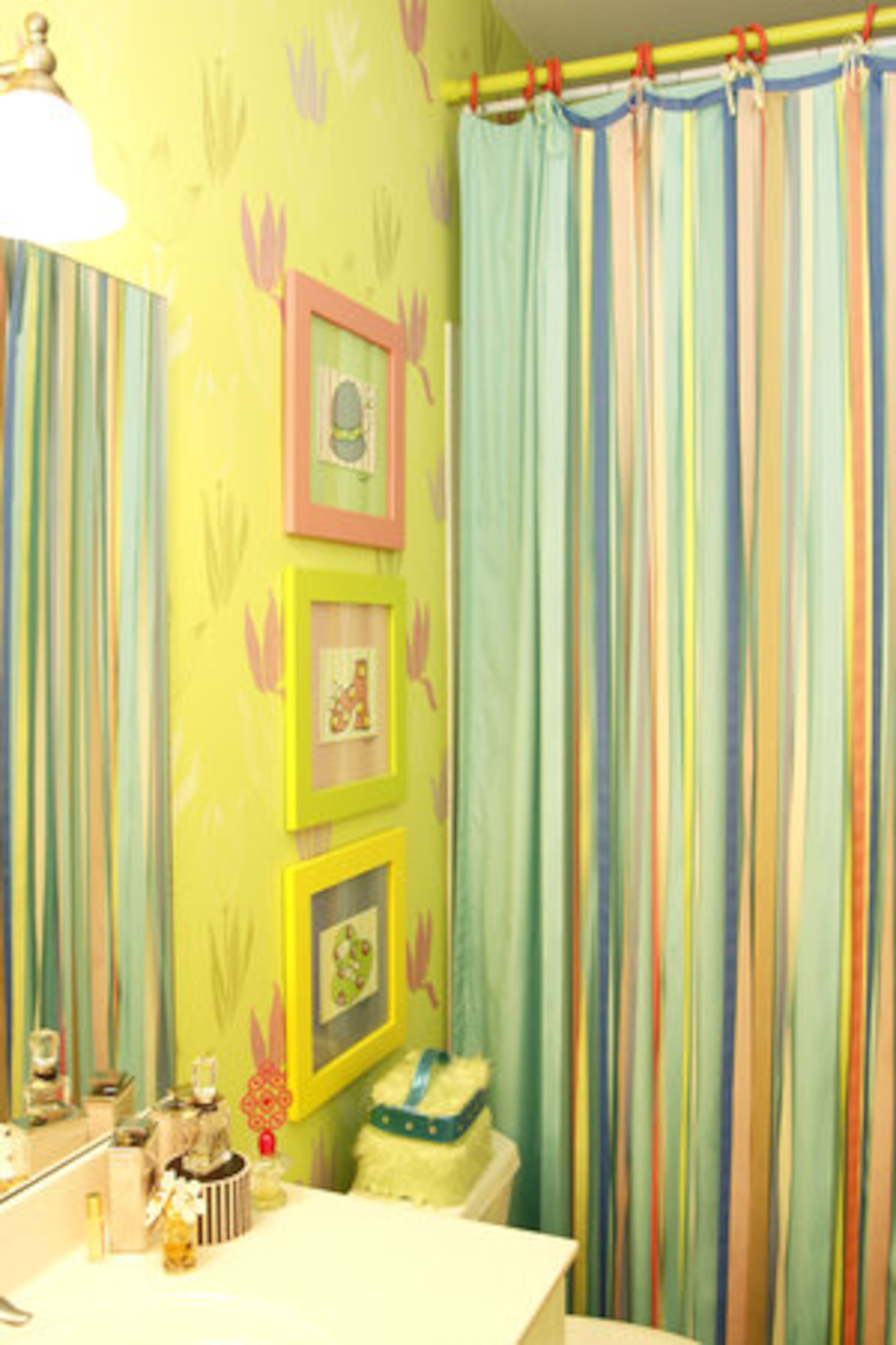 Arianna's bathroom is whimsical and youthful without echoing the pink palette in her room.