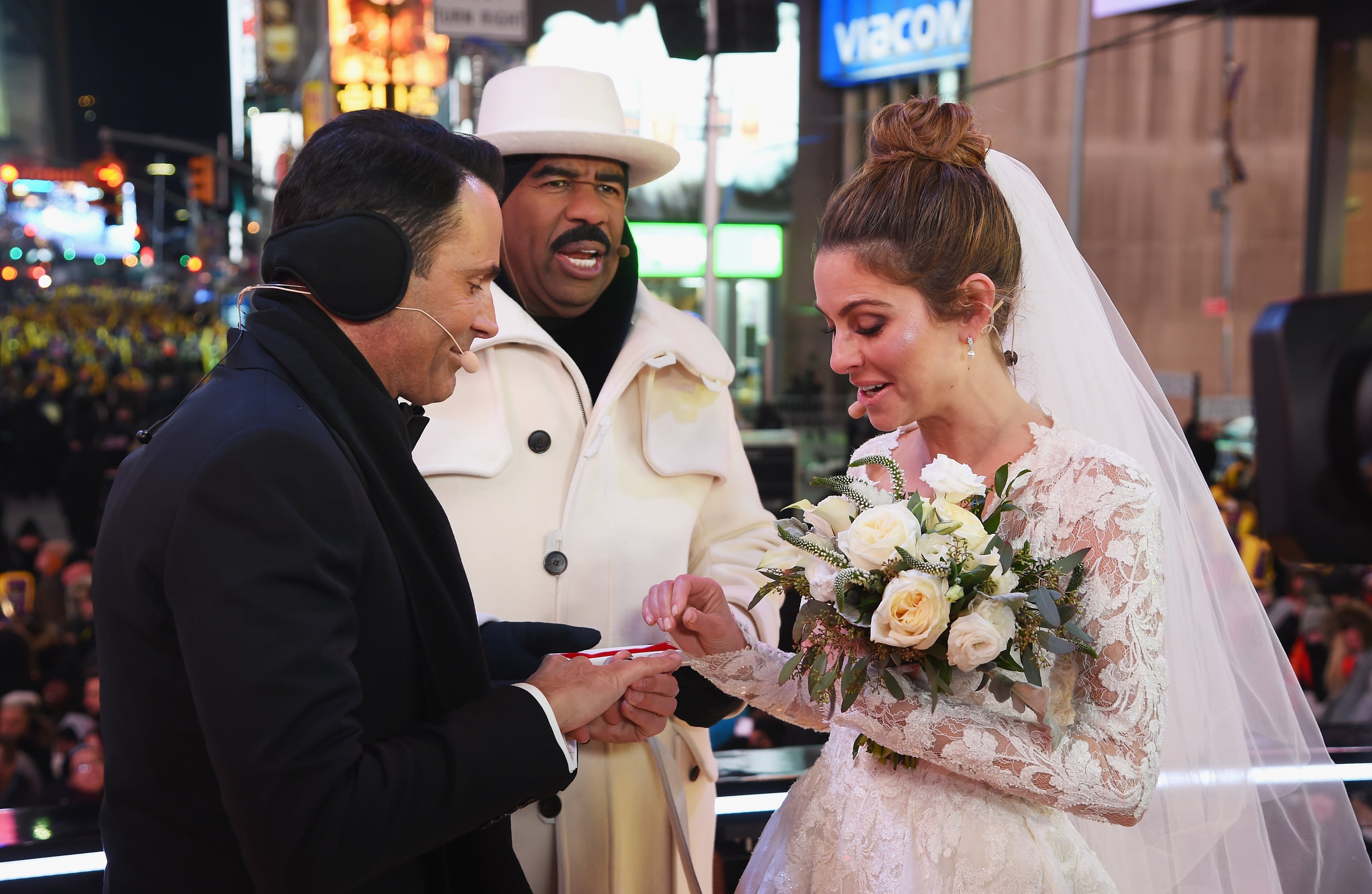 NEW YORK, NY - DECEMBER 31: Steve Harvey (C) attends as Keven Undergaro (L) and Maria Menounos have their wedding ceremony during Maria Menounos and Steve Harvey Live from Times Square at Marriott Marquis Times Square on December 31, 2017 in New York City. (Photo by Dimitrios Kambouris/Getty Images for MM)