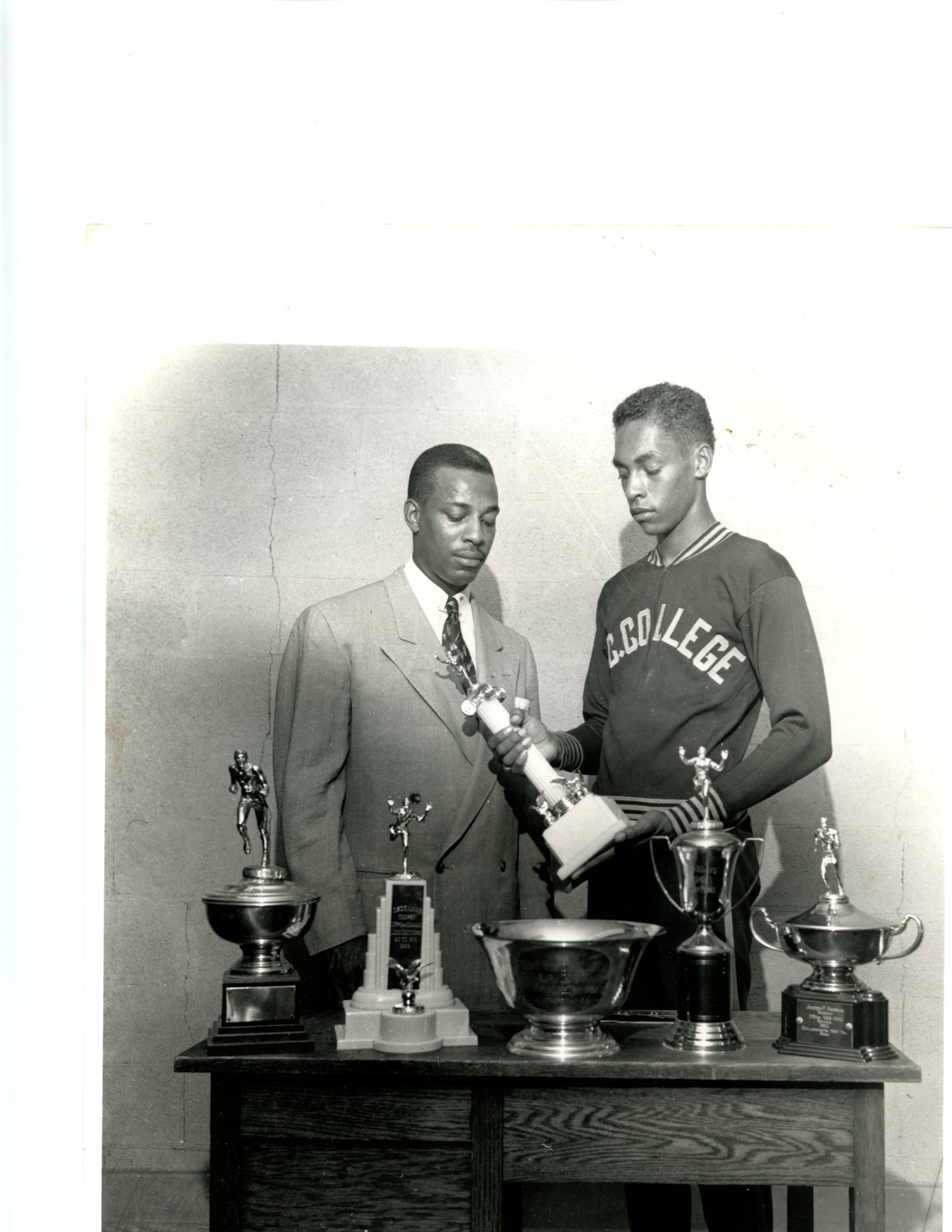 Lee Calhoun (right) with NCCU track coach and future U.S. Olympic Track and Field Head Coach LeRoy T. Walker. Calhoun is one of NCCU's greatest track athletes, winning gold in the 110 meter hurdles in the 1956 and 1960 Olympics. He was elected to the United States National Track and Field Hall of Fame in 1974.