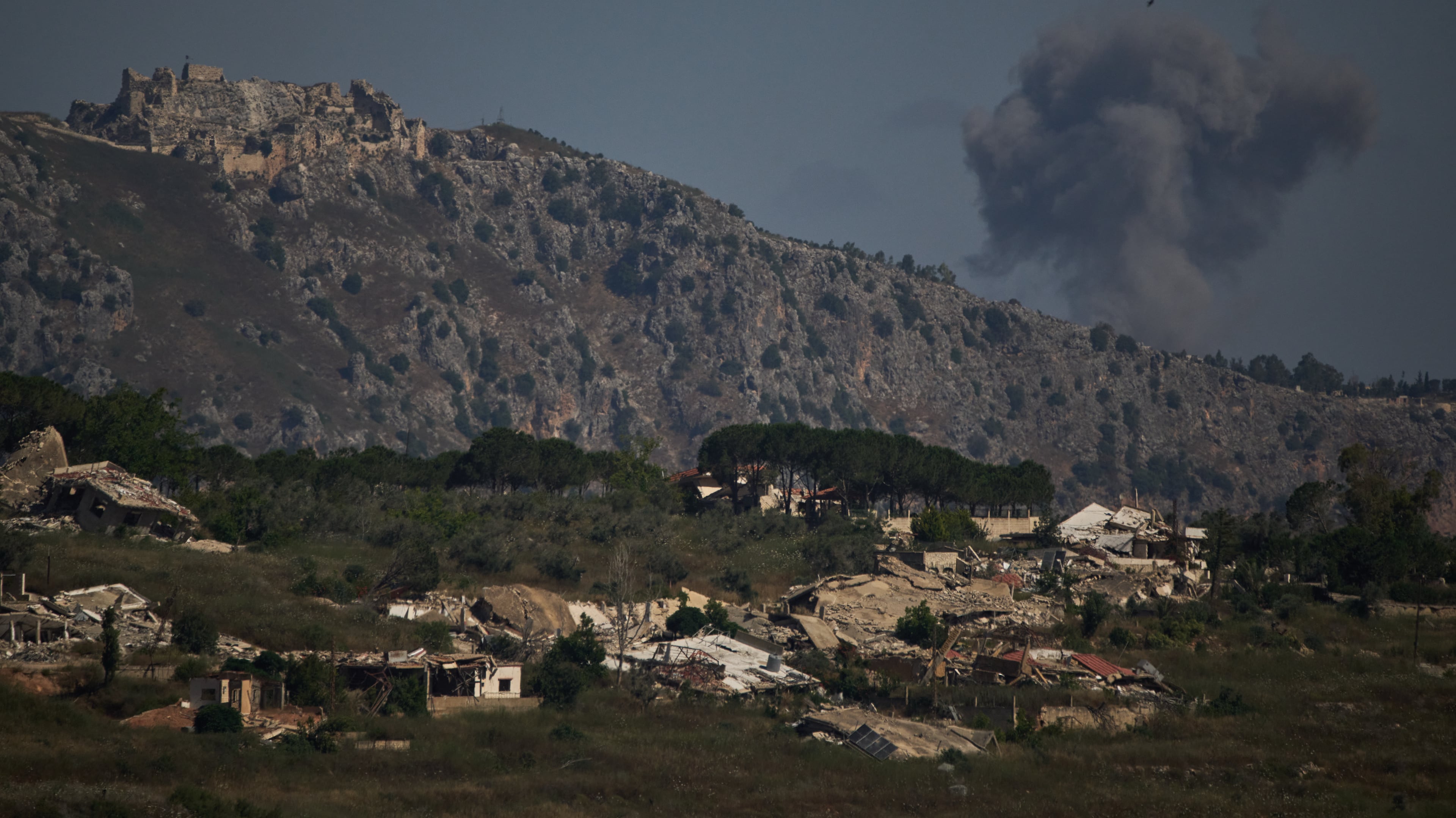 Smoke rises to the sky in an area near Beaufort Castle following an Israeli military strike in southern Lebanon as seen from northern Israel, Friday, June 19, 2026. (AP Photo/Leo Correa)