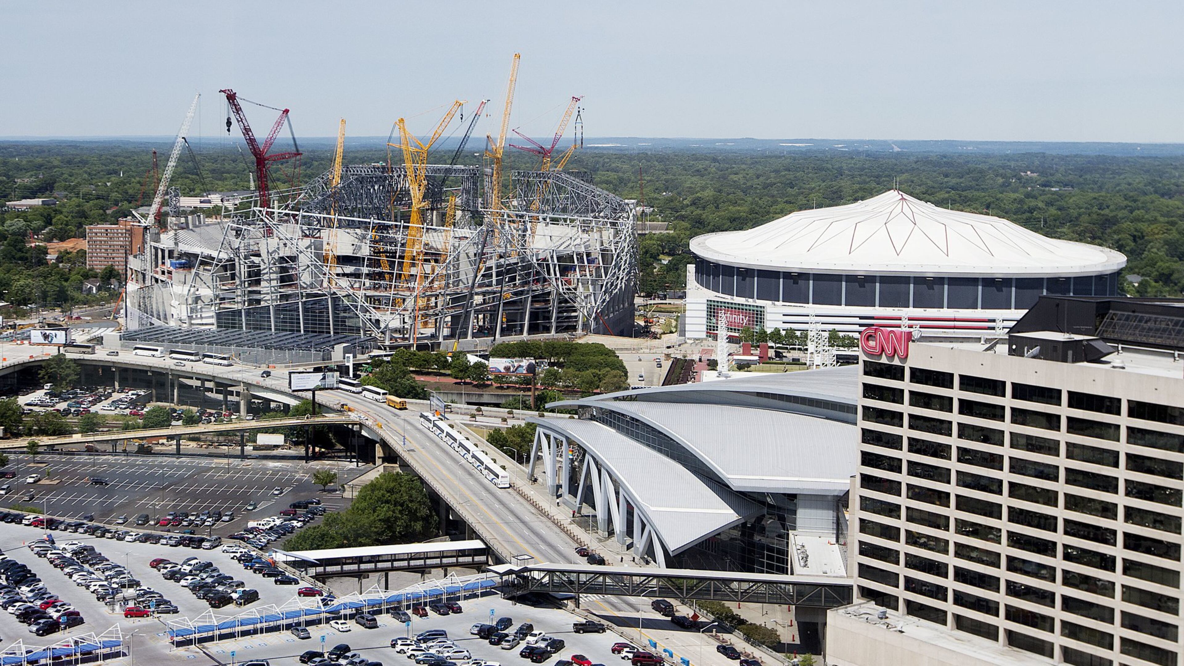 Mercedes-Benz Stadium, slated to open next year, is under construction next to the Georgia Dome. (AP File Photo/David Goldman)