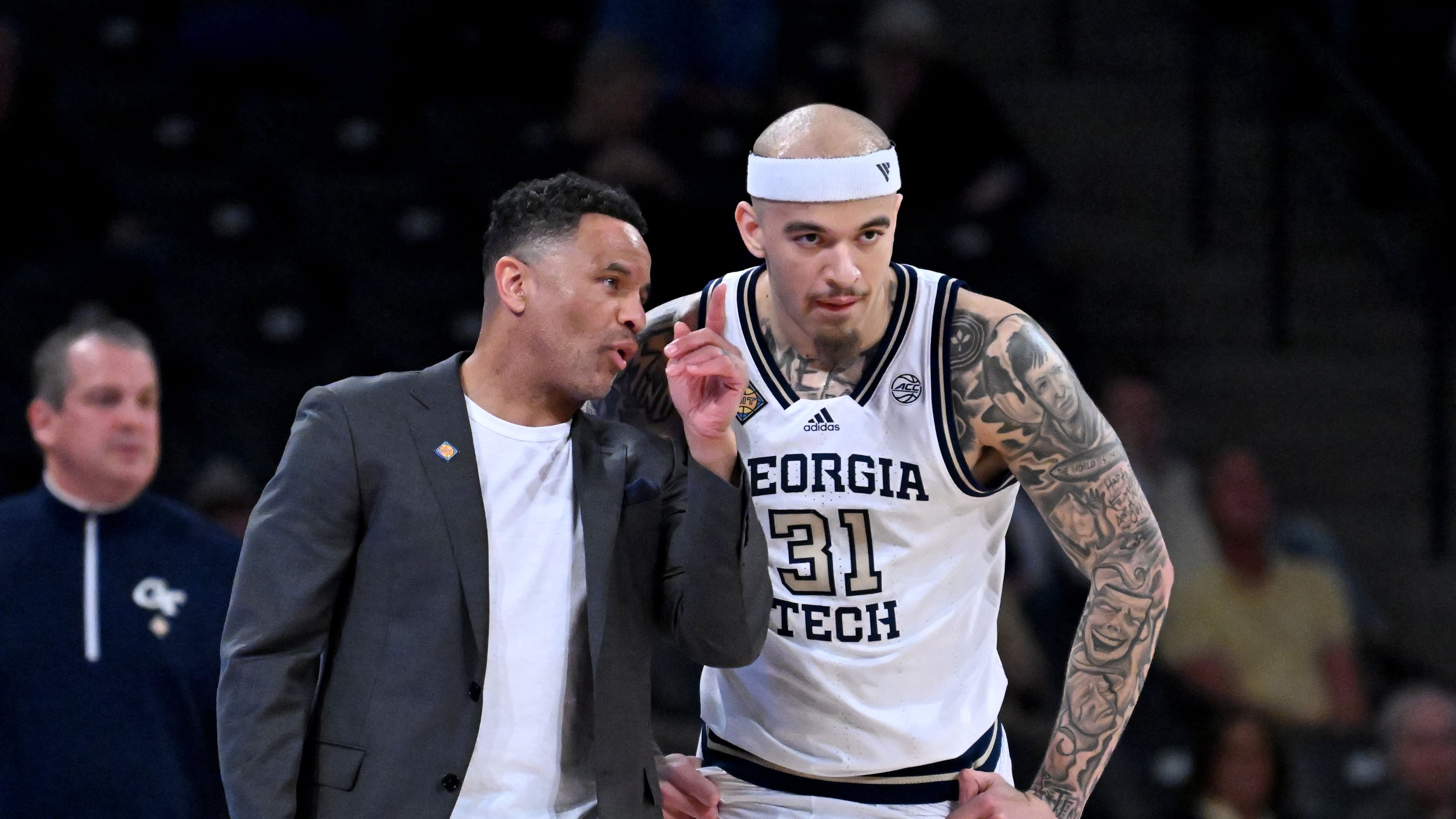 Georgia Tech head coach Damon Stoudamire instructs Georgia Tech forward Duncan Powell (31) during the first half of an NCAA college basketball game in the first round of the NIT, at Georgia Tech’s McCamish Pavilion, Tuesday, March 18, 2025, in Atlanta. (Hyosub Shin / AJC)