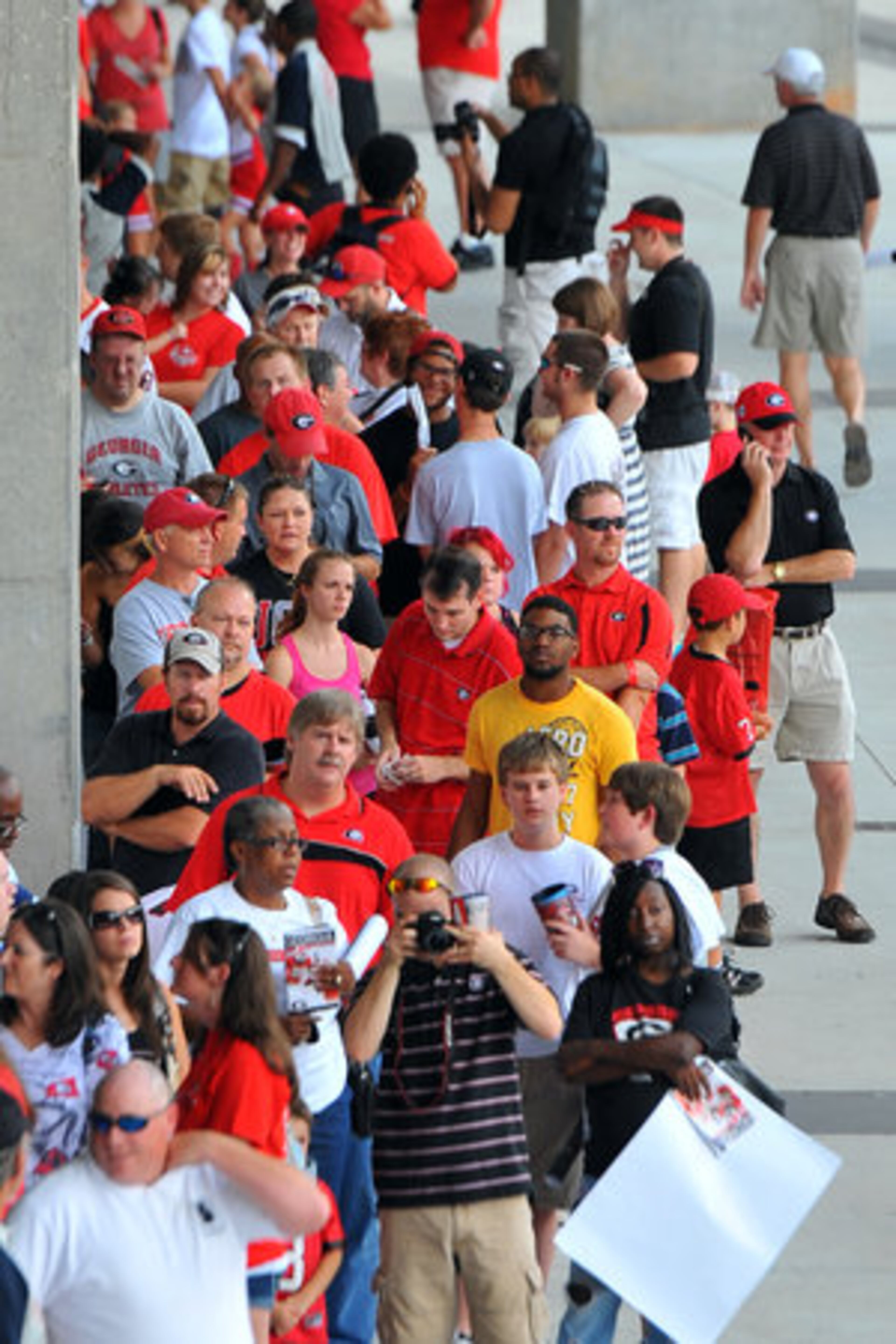 UGA fans wait in line for an autograph during Fan Day at Sanford Stadium Saturday, Aug. 18, 2012.