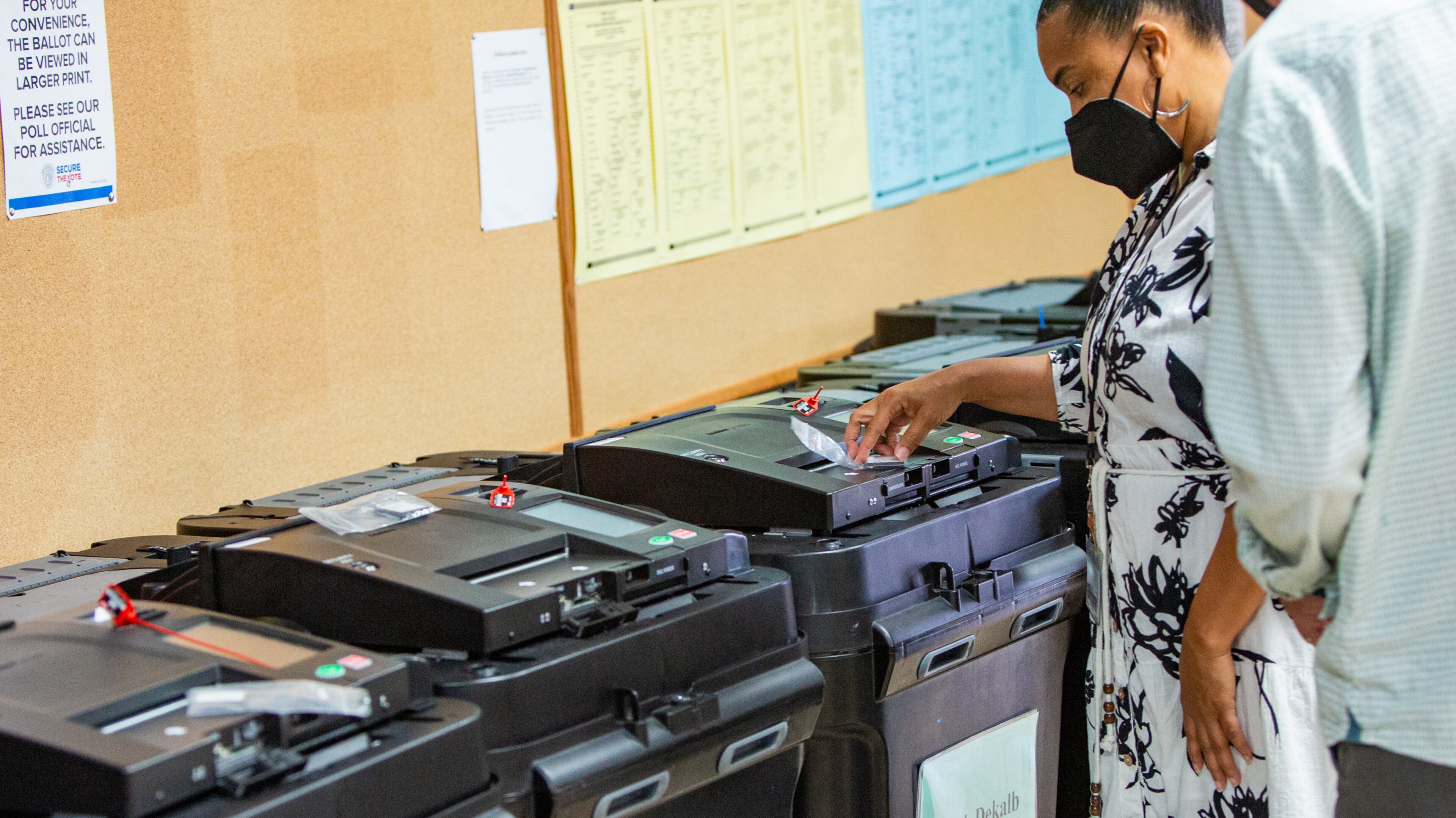 DeKalb County Elections Executive Director Keisha Smith confirms the cards match the precinct machines before testing begins Saturday, May 28, 2022. The DeKalb County Elections Office had to recount votes due to a programming error that apparently allocated votes incorrectly in the election reporting of a County Commission race. The recount will resume Sunday. (Photo: Jenni Girtman for The Atlanta Journal-Constitution)
