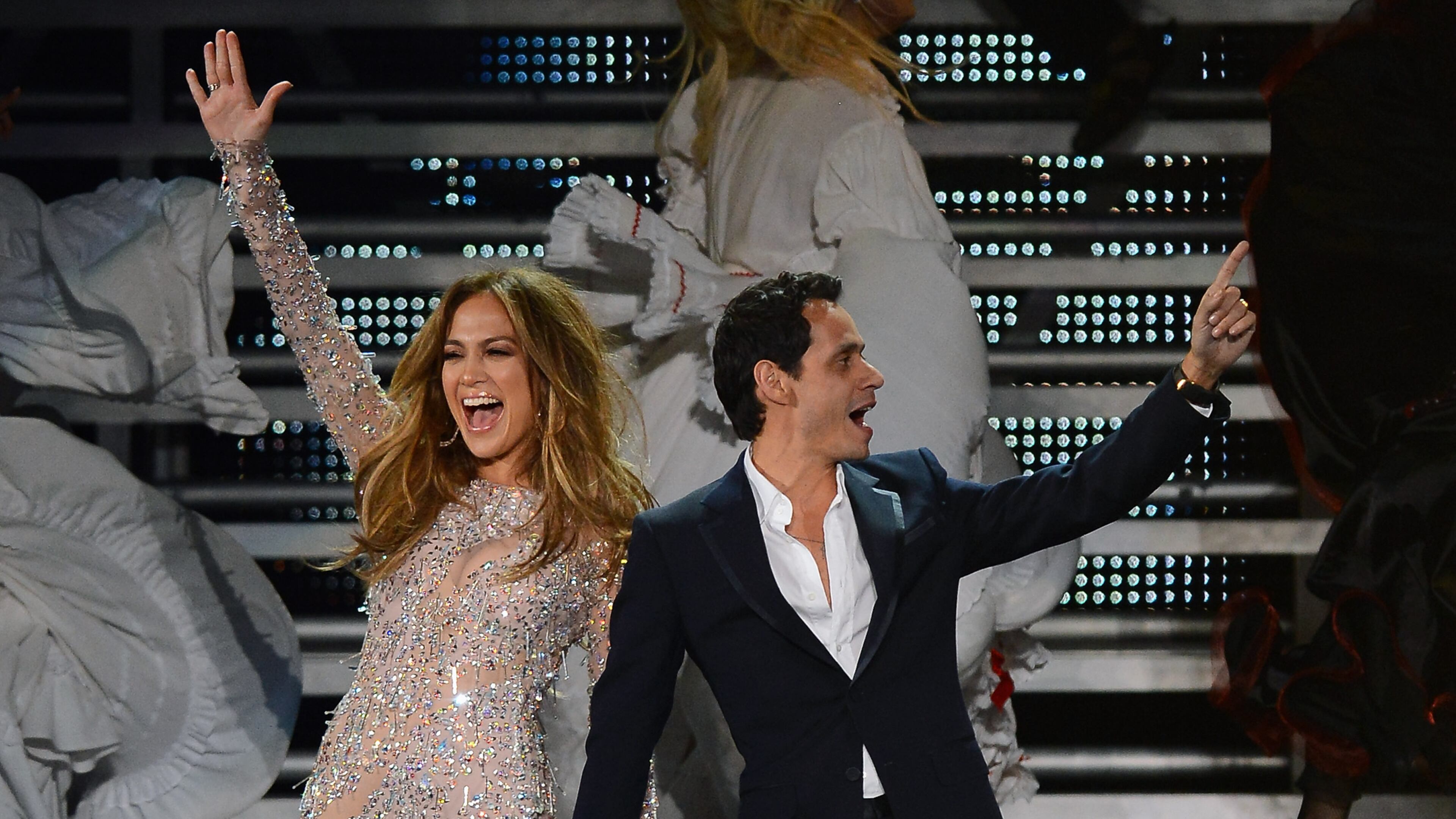 LAS VEGAS, NV - MAY 26: Singer/actress Jennifer Lopez (L) and singer Marc Anthony appear during the finale of the Q'Viva! The Chosen Live show at the Mandalay Bay Events Center on May 26, 2012 in Las Vegas, Nevada. (Photo by Ethan Miller/Getty Images)