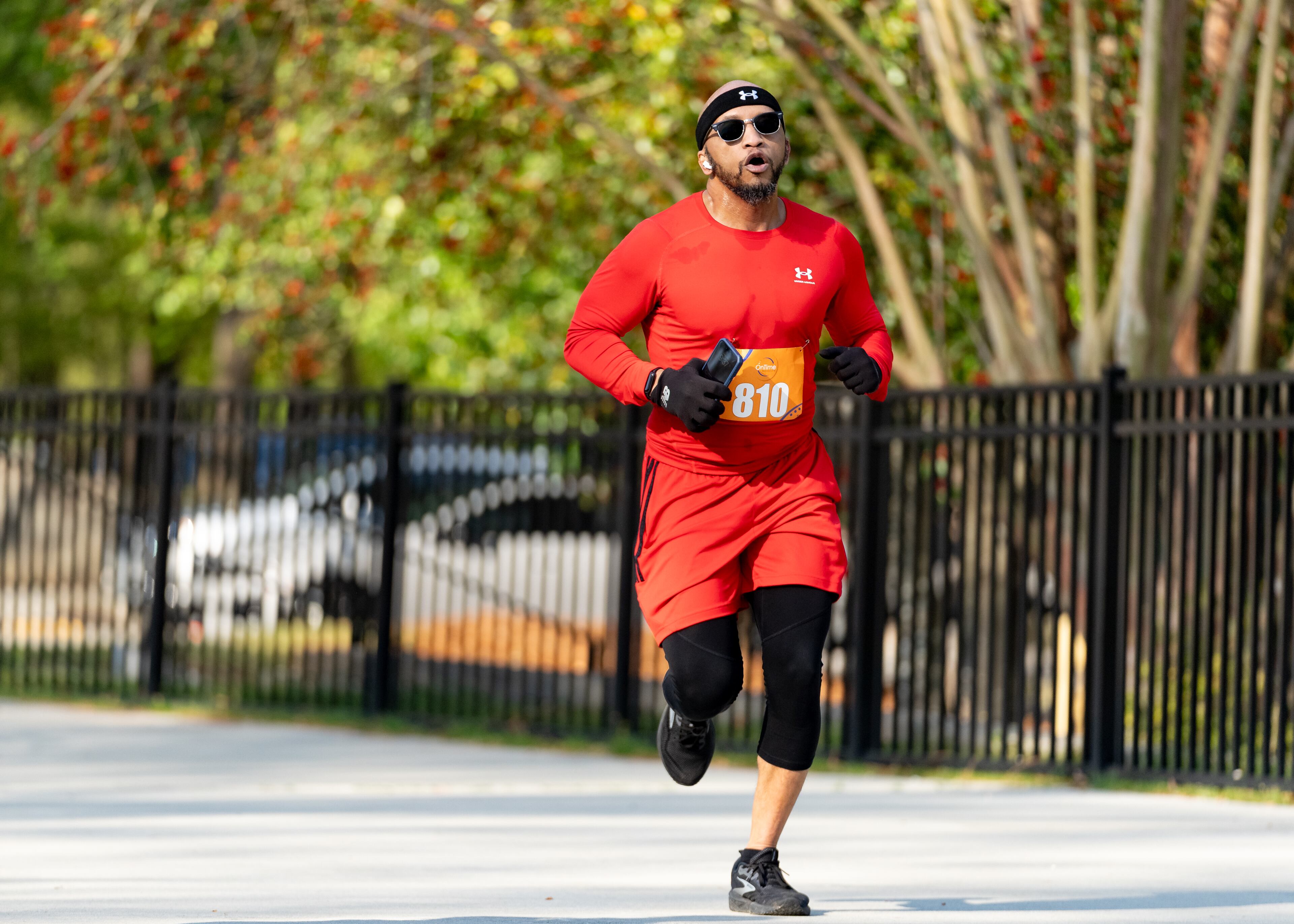 Michael Lott approaches the finish line at the Daffodil Dash at Brook Run Park in Dunwoody on Sunday, April 7, 2024. (Ben Hendren for The Atlanta Journal-Constitution)