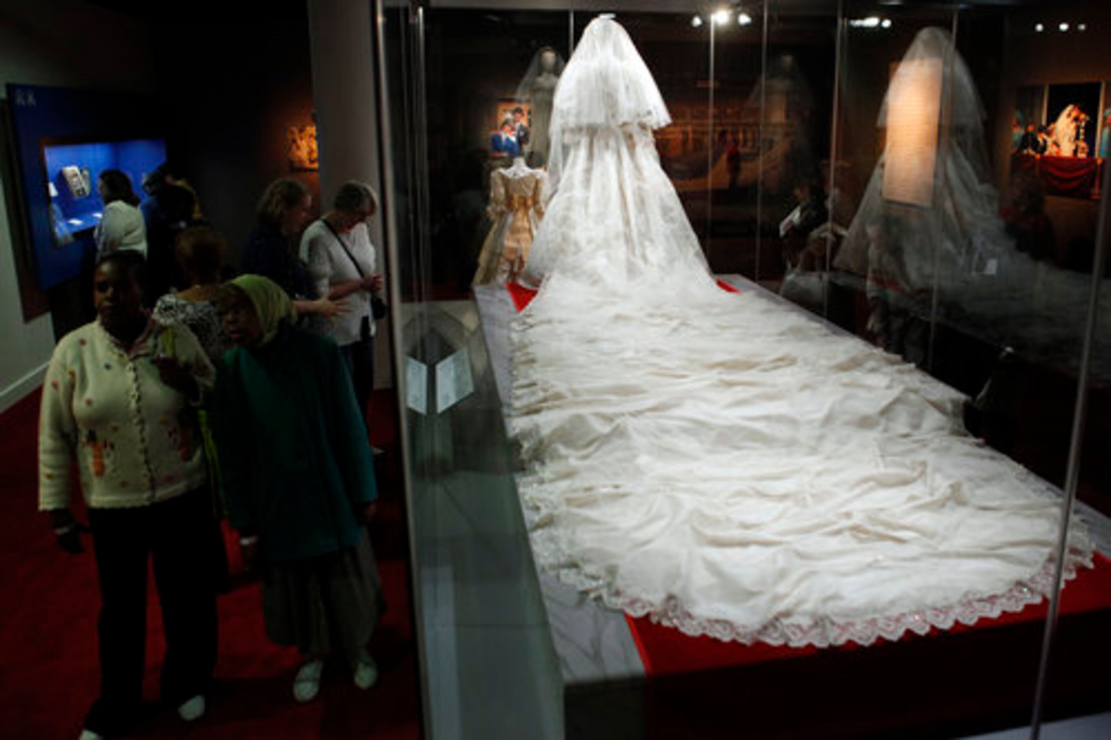 Visitors get a closeup look at Diana's wedding gown and its 25-foot train.