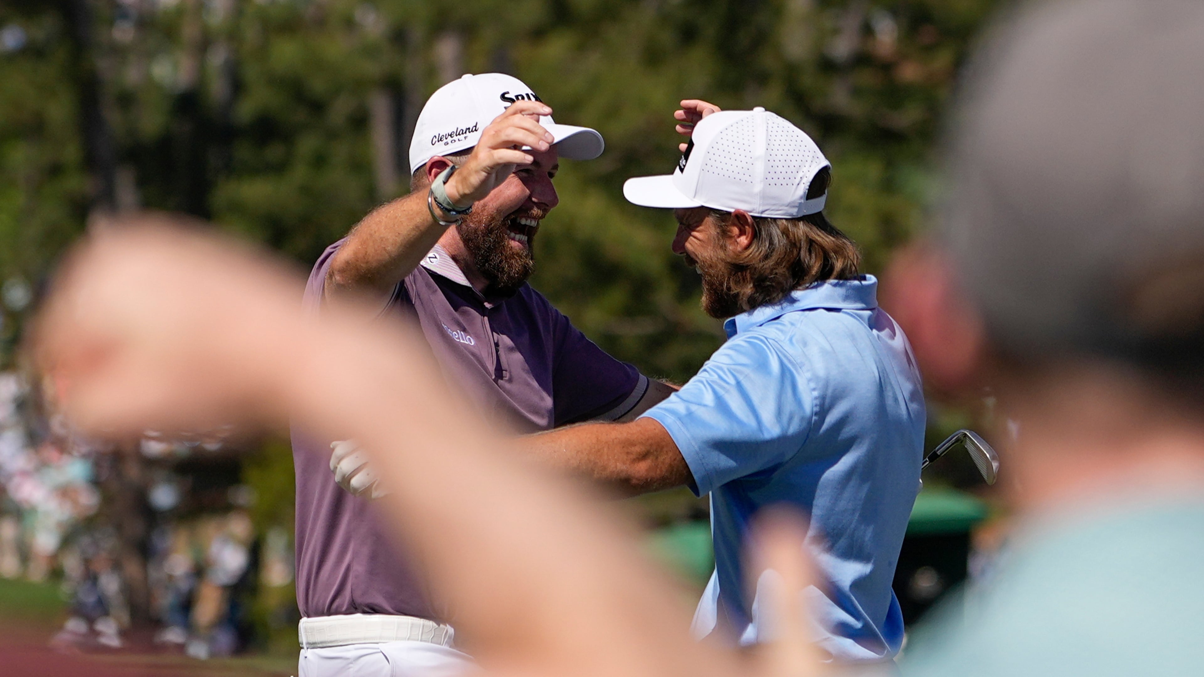 Shane Lowry, of Ireland, waves after a hole-in-one on the sixth hole during the third round of the Masters golf tournament at the Augusta National Golf Club, Saturday, April 11, 2026, in Augusta, Ga. (AP Photo/Ashley Landis)