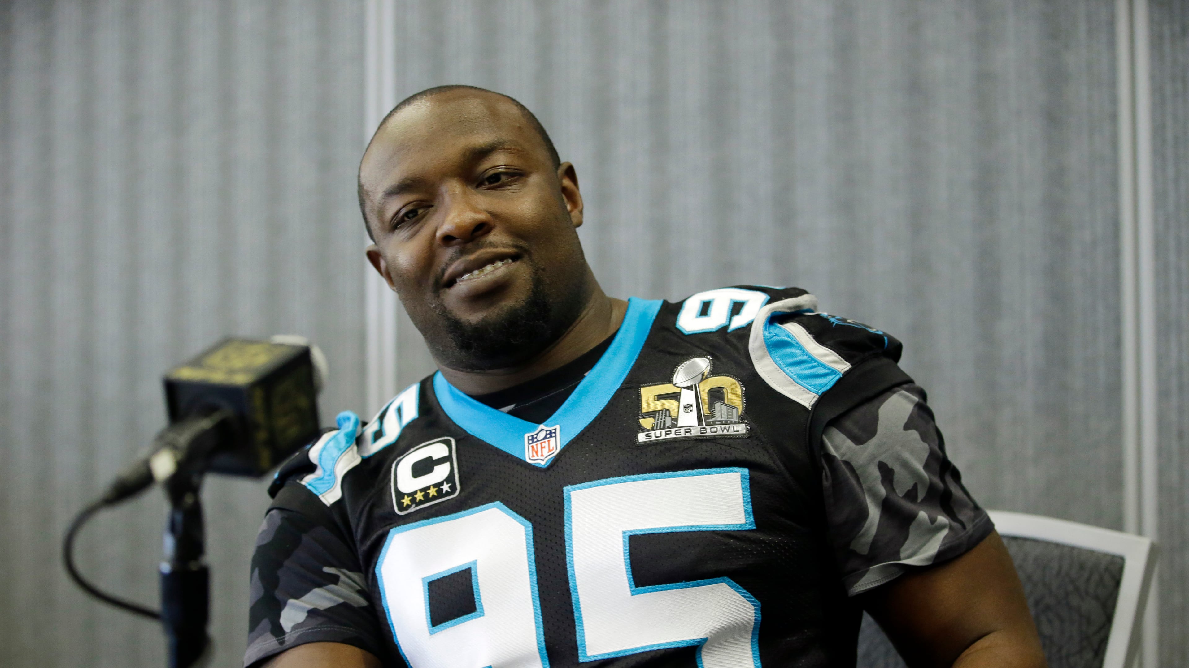 FILE - In this Feb. 7, 2015, file photo, Carolina Panthers defensive end Charles Johnson (95) is shown during a press conference in San Jose, Calif. The Carolina Panthers released longtime defensive end Charles Johnson on Thursday, a move that will save the team $11 million under the 2016 NFL salary cap. (AP Photo/Marcio Jose Sanchez, File)