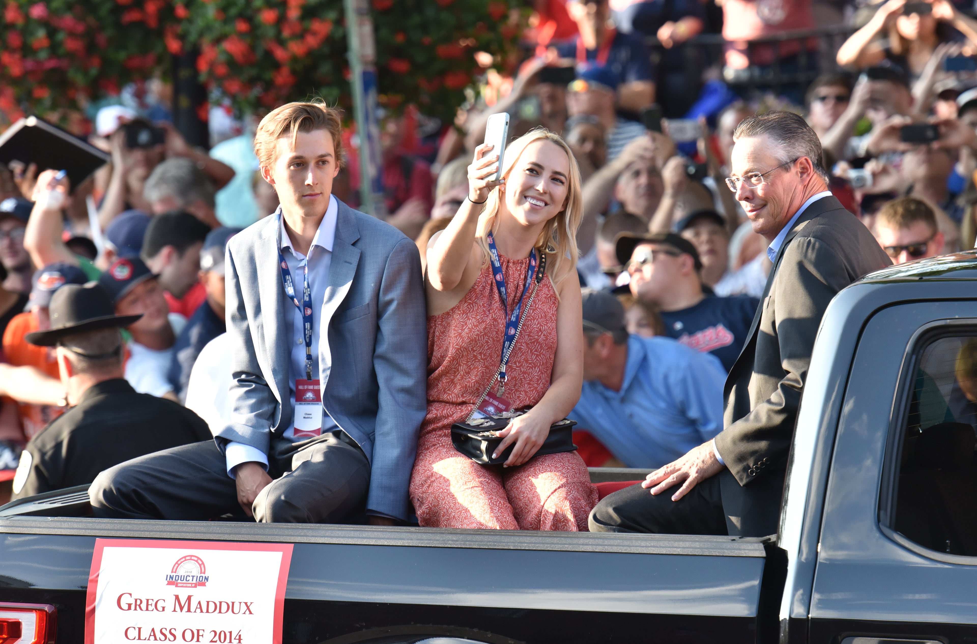 July 28, 2018 Cooperstown, N.Y. - National Baseball Hall of Fame member Greg Maddux and his family pose for a selfie during Hall of Fame Legends Parade in Cooperstown, N.Y. on Saturday, July 28, 2018. Braves legend Chipper Jones is set for induction into the National Baseball Hall of Fame on Sunday in Cooperstown, N.Y. HYOSUB SHIN / HSHIN@AJC.COM