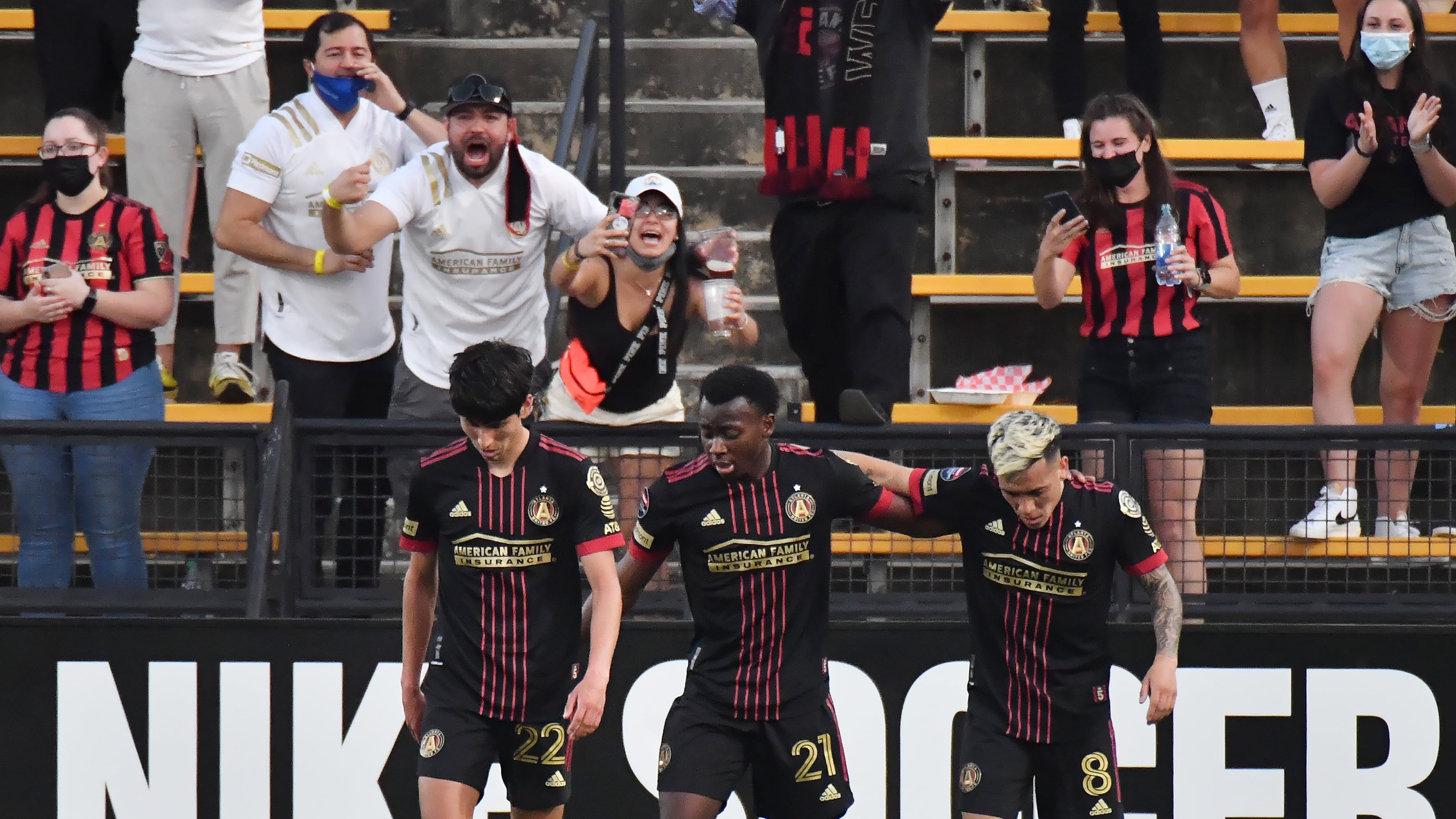 Atlanta United Jurgen Damm (22), George Bello (21) and Ezequiel Barco (8) celebrate after Jurgen Damm scored with Ezequiel Barco's assist in the second half at Fifth Third Bank Stadium in Kennesaw on Tuesday, April 13, 2021. Atlanta United won 1-0 over LD Alajuelense. (Hyosub Shin / Hyosub.Shin@ajc.com)