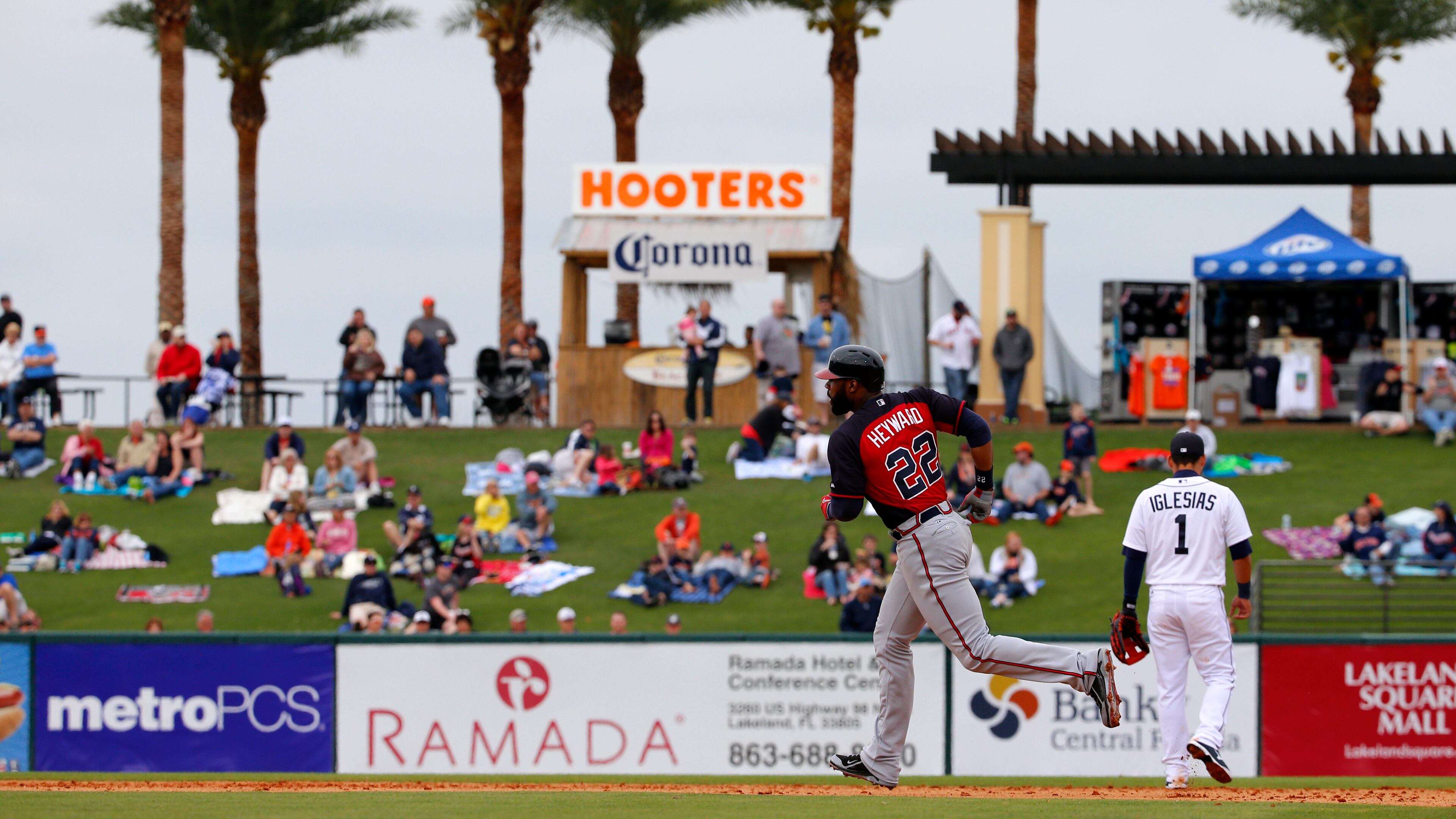 Atlanta Braves’ Jason Heyward (22) rounds second past Detroit Tigers shortstop Jose Iglesias (1) after hitting a solo home run off Tigers pitcher Melvin Mercedes during the third inning of an exhibition spring training baseball game in Lakeland, Fla., Thursday, Feb. 27, 2014. The Tigers won 5-2.