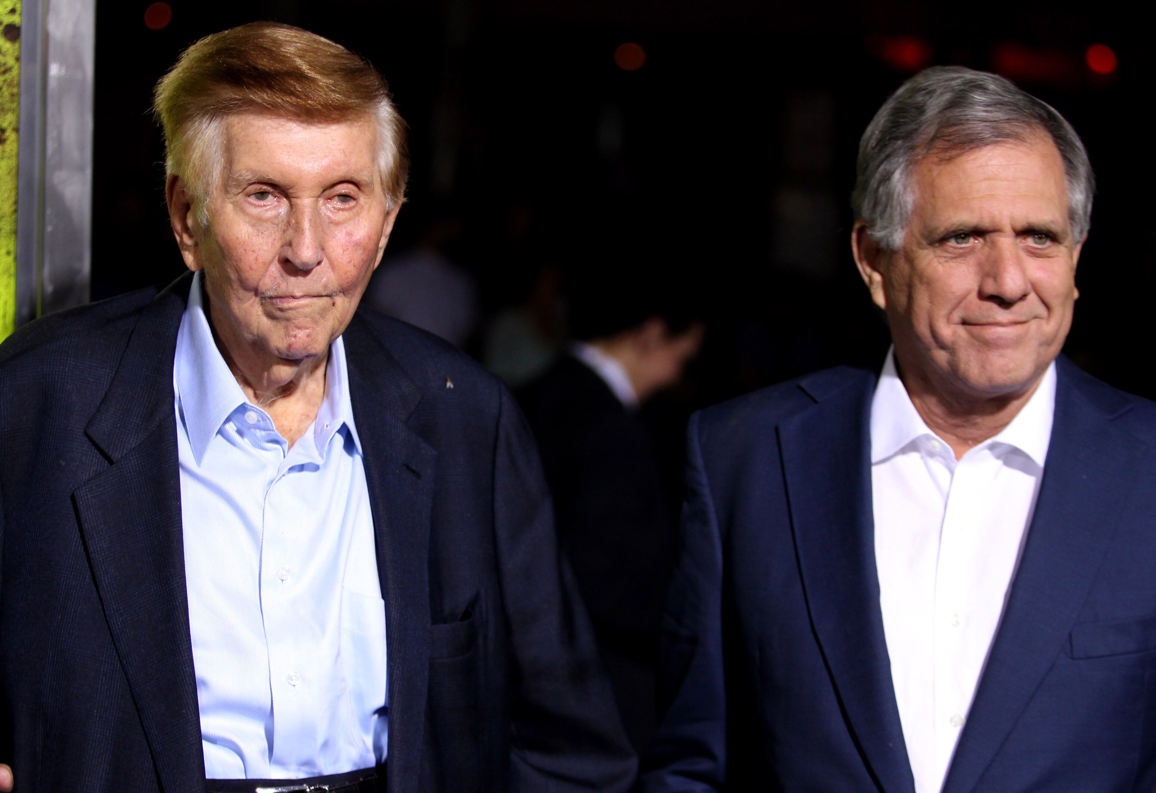 Studio executives Sumner Redstone, left, and Leslie Moonves attend the premiere of "Seven Psychopaths" at the Bruin Theatre on Monday, Oct. 1, 2012, in Los Angeles.