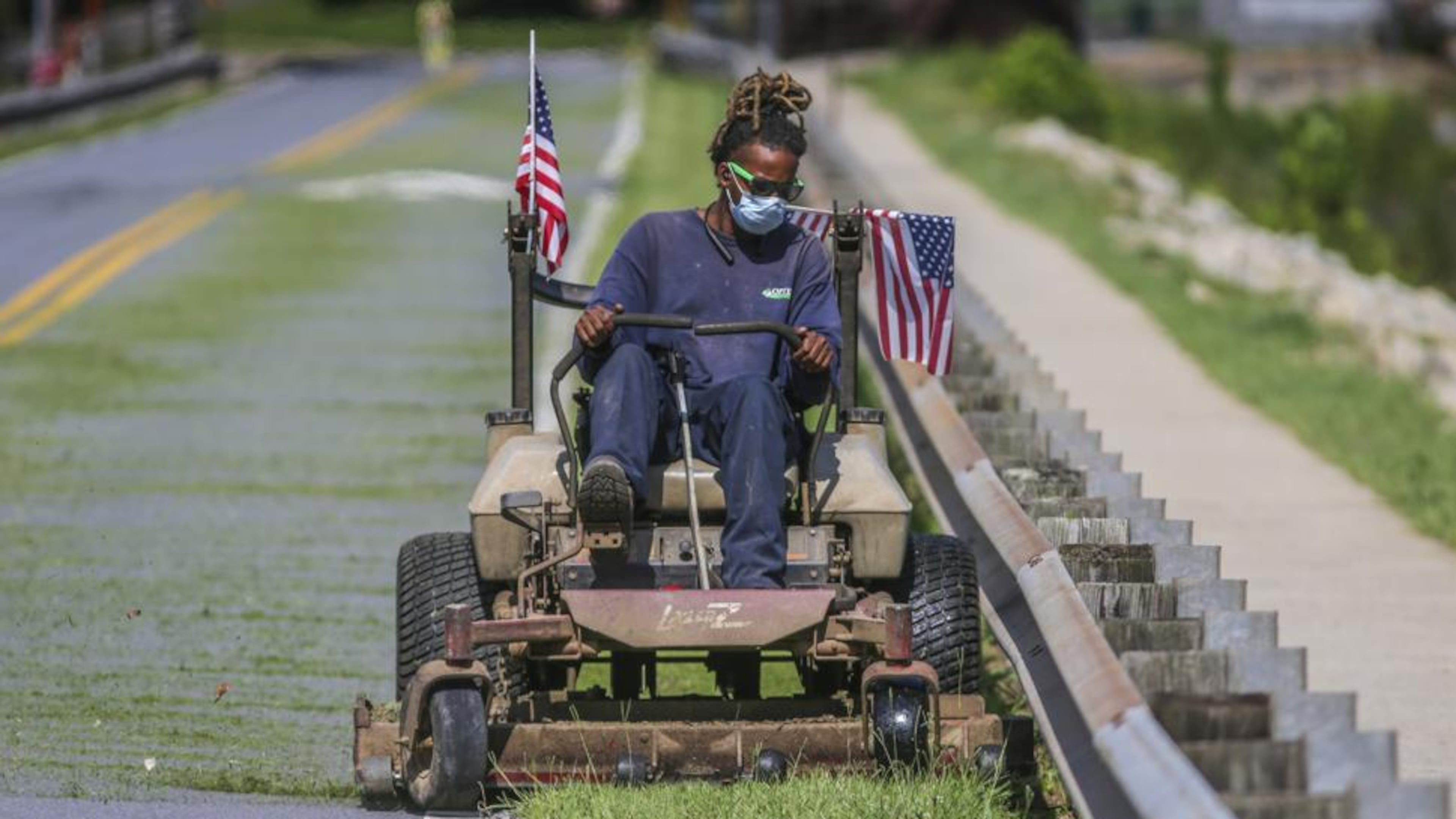 Fayette County has revised its 2018 grass-mowing plan to improve maintenance along major highways. AJC file photo