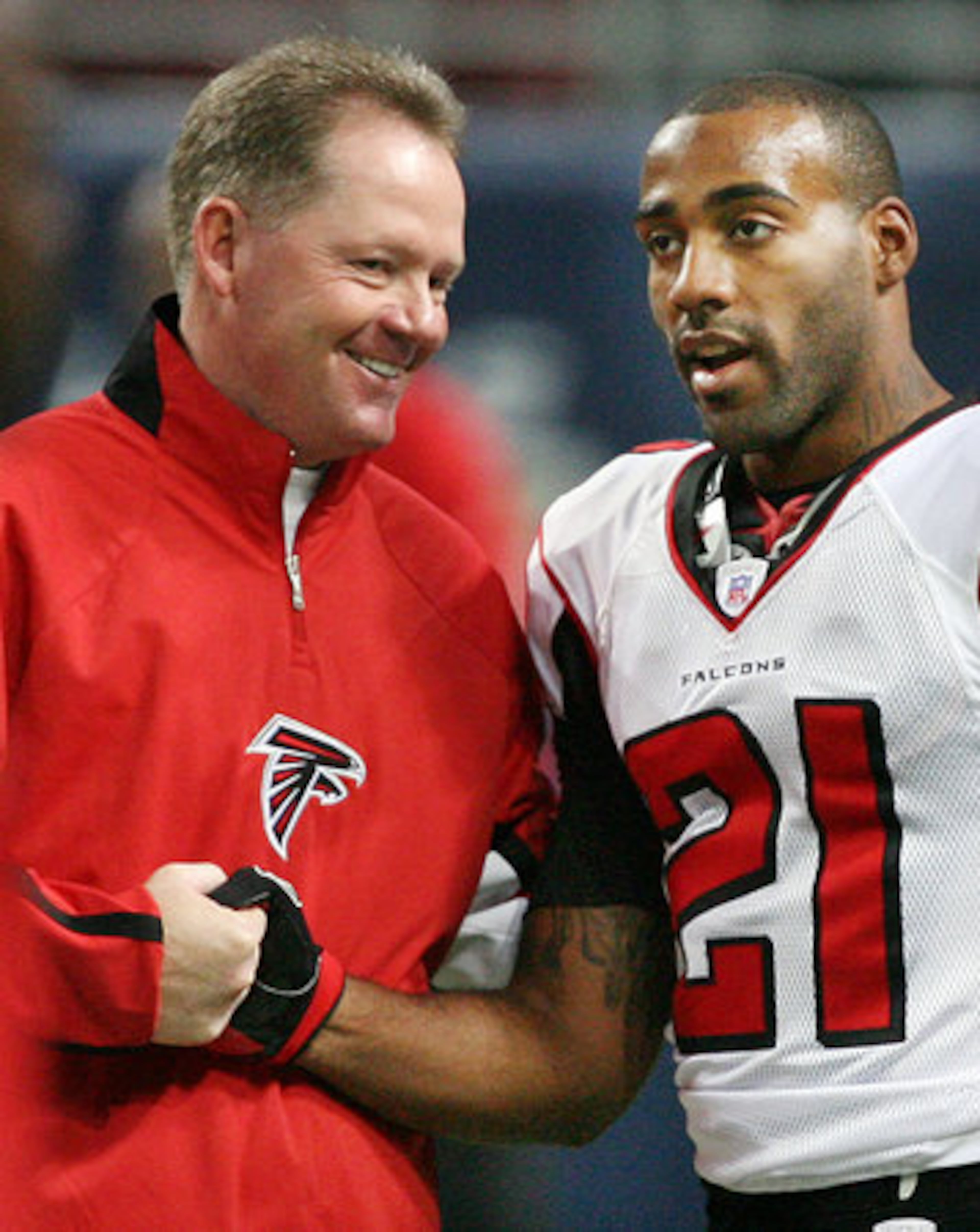 Petrino (left) was the Falcons head coach in 2007 before leaving during the season to take the Arkansas job.