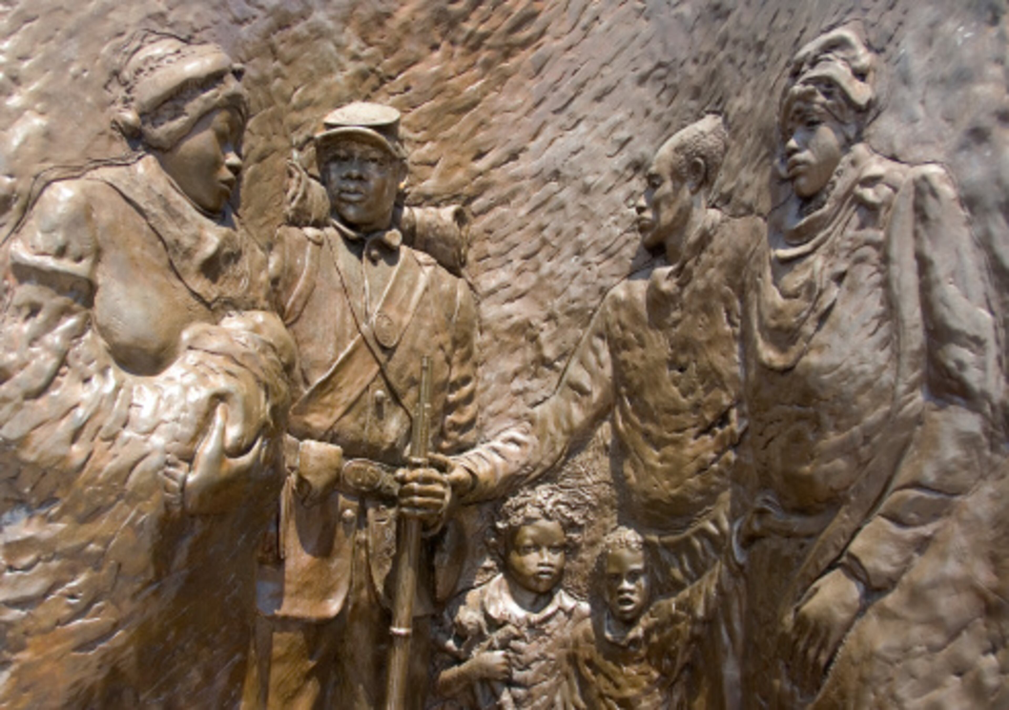When daylight ends, the nightlife along the U Street corridor lights up. Long considered the center of D.C.'s music scene, U Street is located west of Dupont Circle in a largely Victorian Neighborhood. In the 1920s, the area was home to the largest African-American community in the U.S., and was known as "Black Broadway." Duke Ellington's childhood home is nearby. Pictured is 'Spirit of Freedom,' the African American Civil War Memorial.