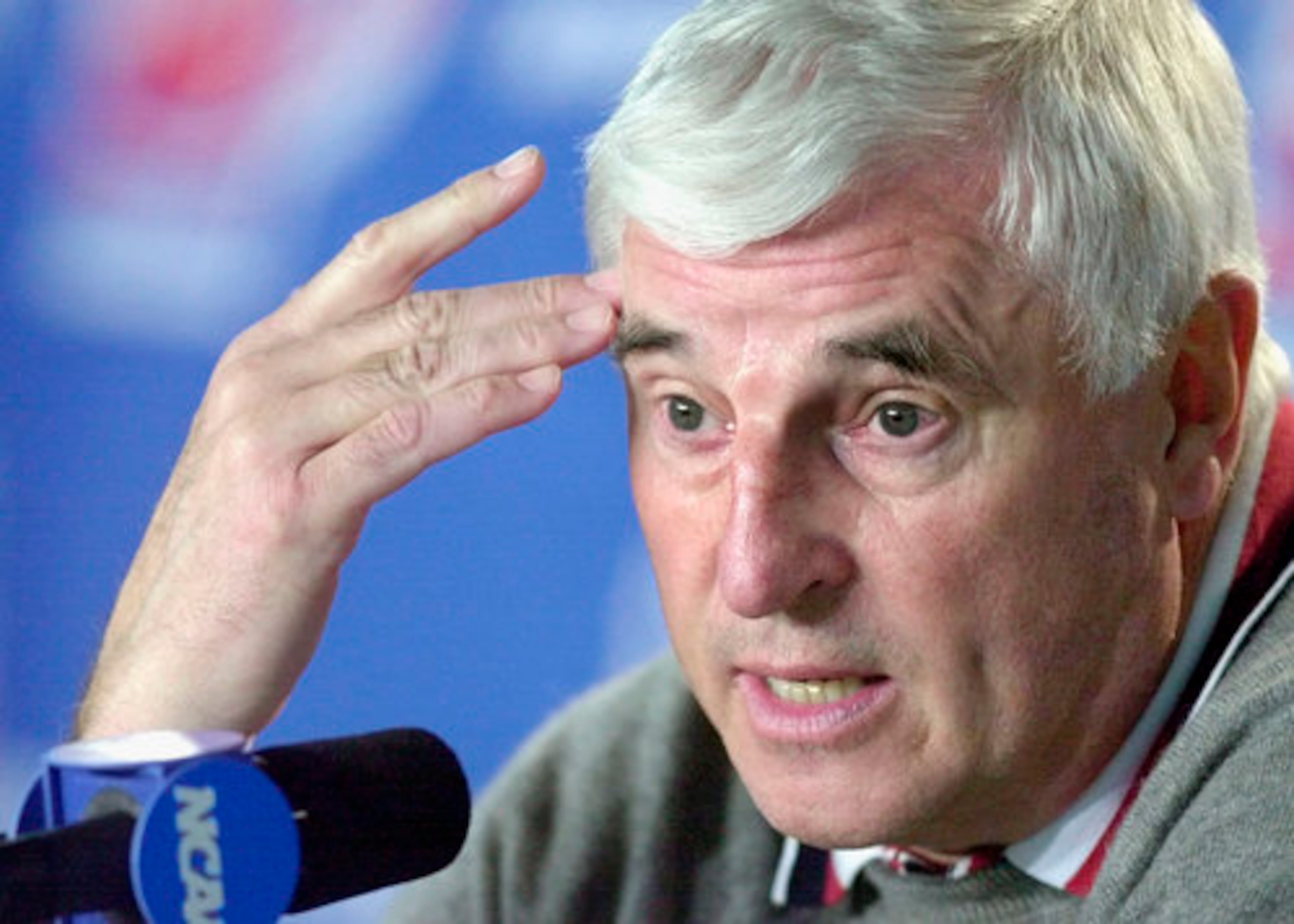 INDIANA BASKETBALL: Legendary coach Bobby Knight was fired in 2000 after allegedly grabbing a student's arm. Knight was warned earlier in the year about his behavior after an investigation into accusations he choked one of his players during practice in 1997, an act caught on videotape.