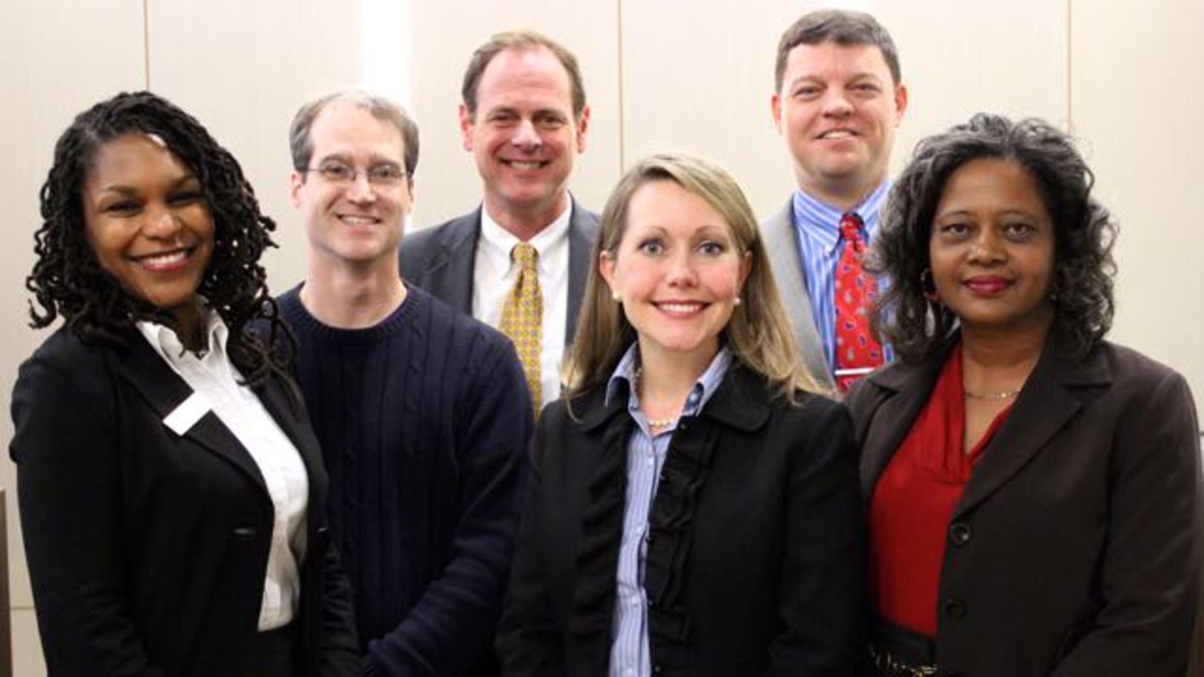 Decatur’s school board,l-r, Tasha White, Co-Chair Garrett Goebel, Lewis Jones, Chair Annie Caiola, Superintendent David Dude and Bernadette Seals. Board members, not counting Dude, make $50 per meeting. Though three seats are up for election—Jones and Caiola, with Seals retiring—only one candidate qualified. Courtesy City Schools Decatur