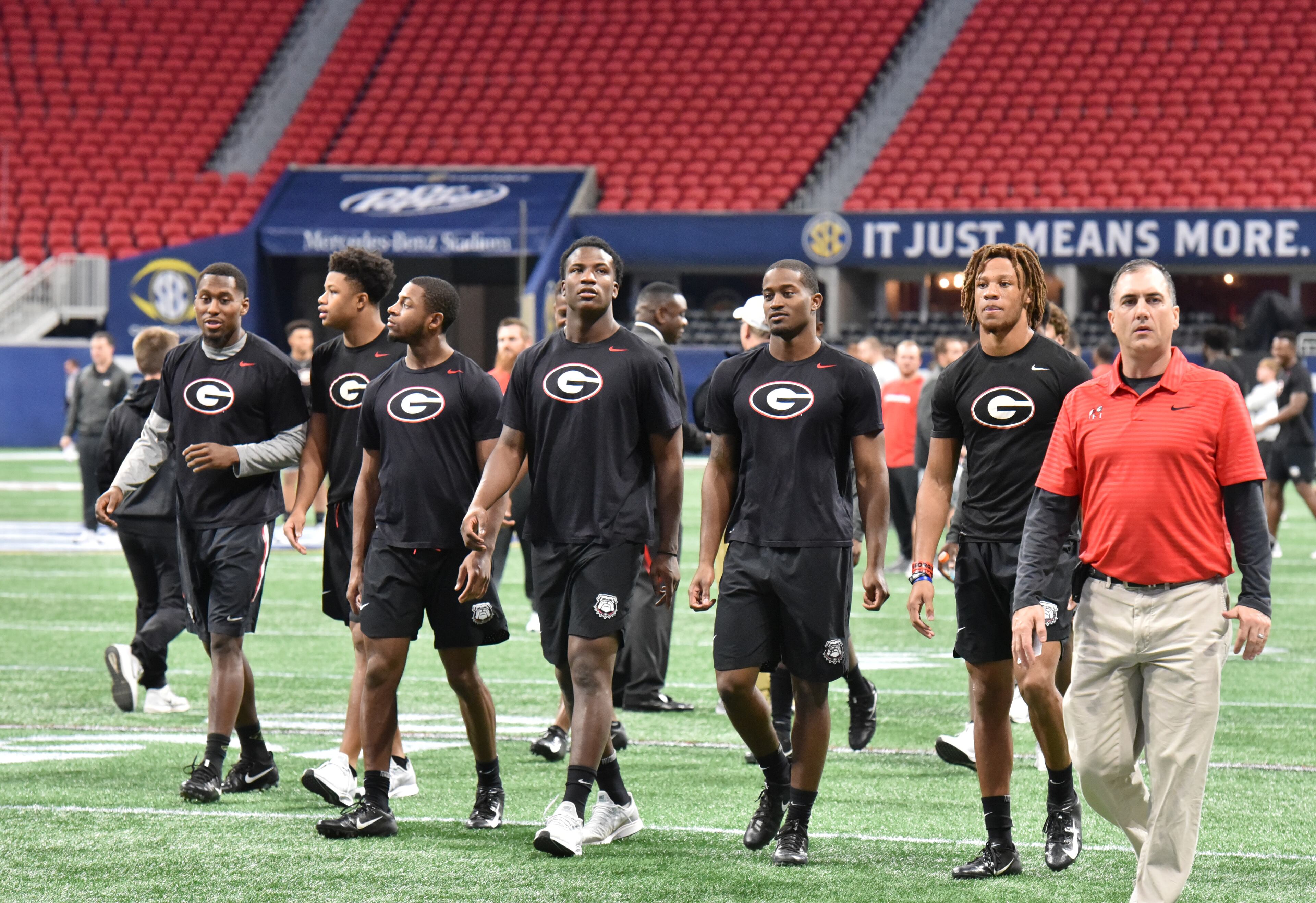 November 30, 2018 Atlanta - Georgia football players enter the football field before their team practice at Mercedes-Benz Stadium on Friday, November 30, 2018. HYOSUB SHIN / HSHIN@AJC.COM