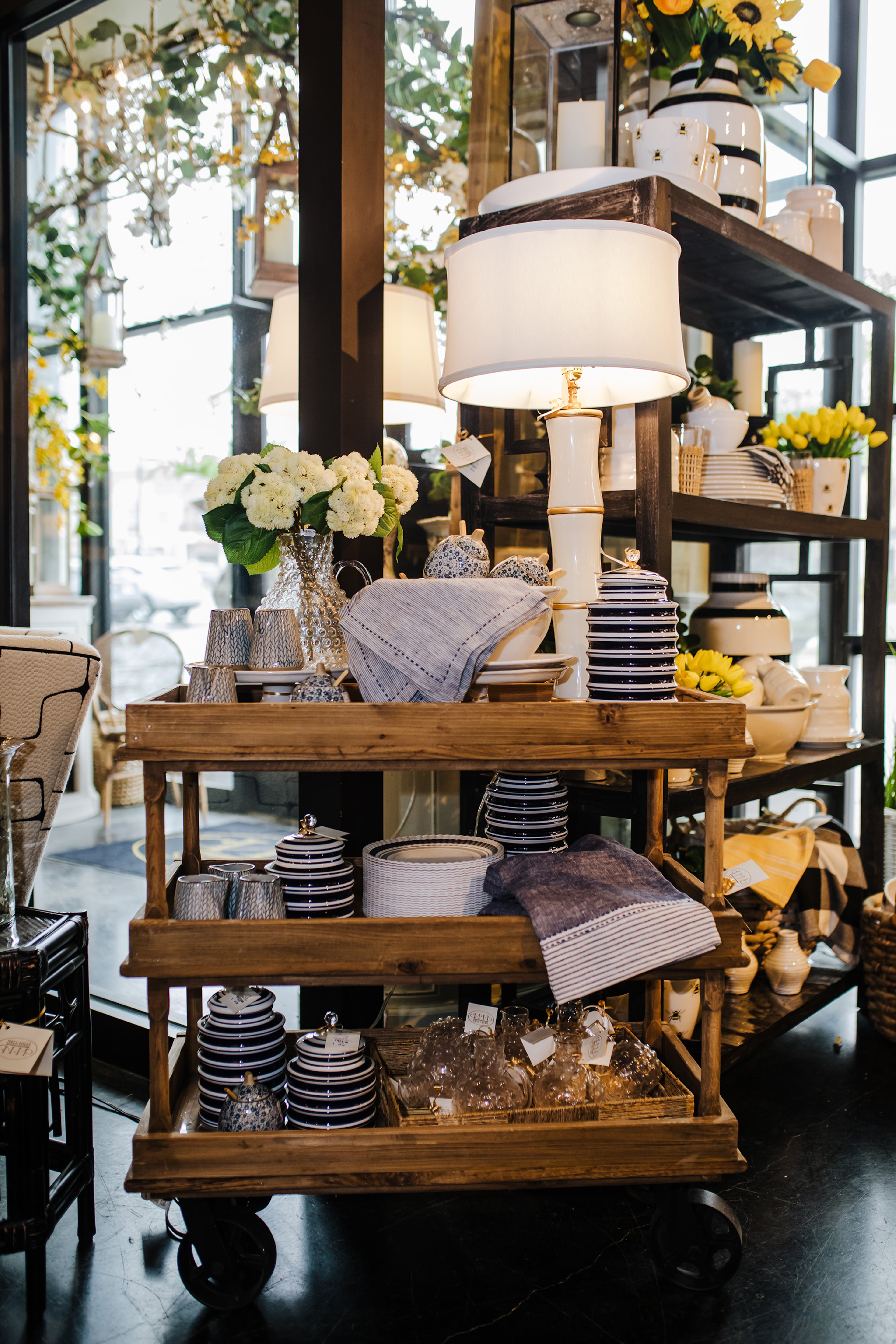 One of the most important parts of decorating a bar cart (like any vignette) is introducing items that provide height. Courtesy/TNS