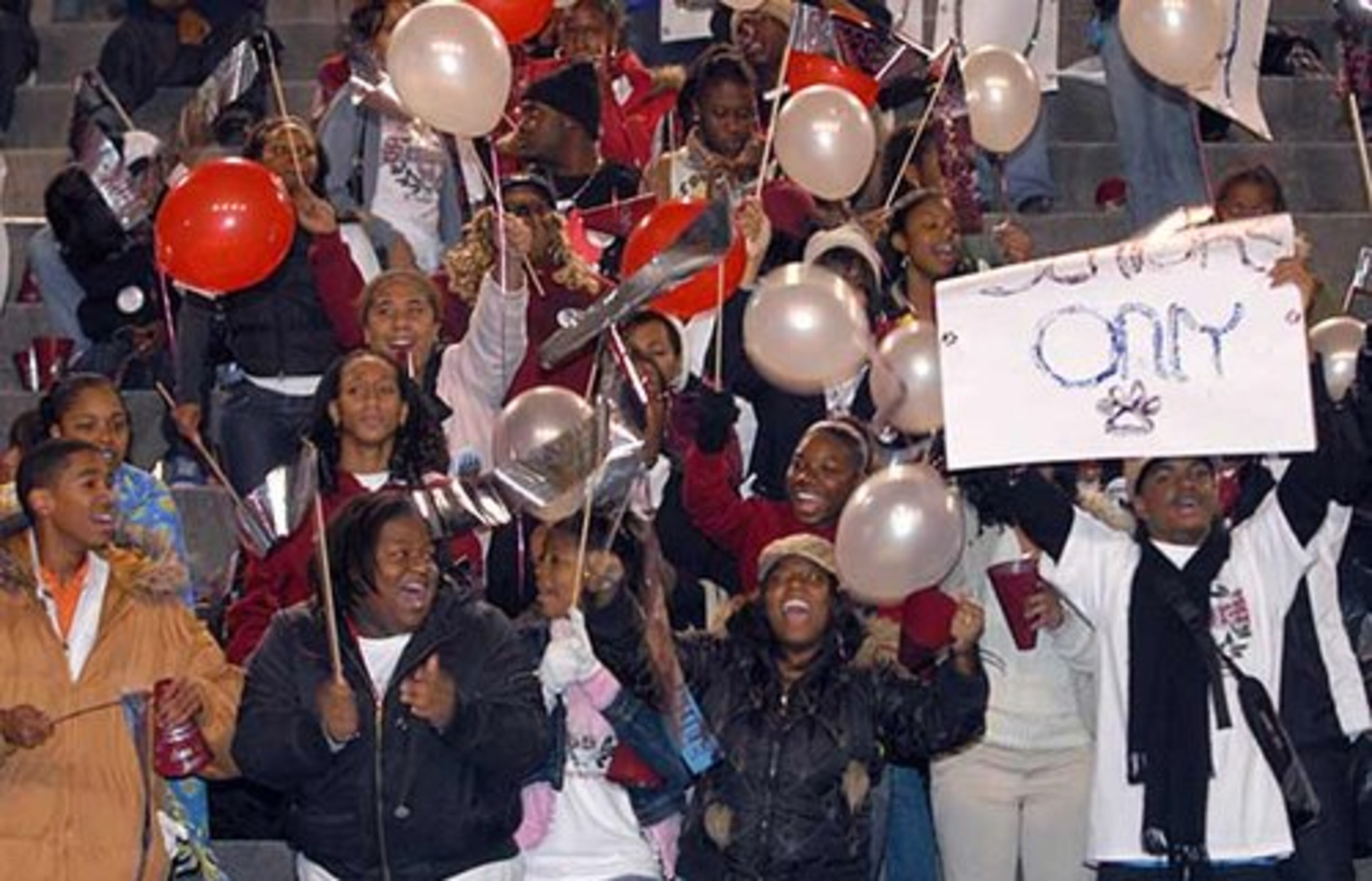 M.L. King fans cheer for the Lions near the start of the game.