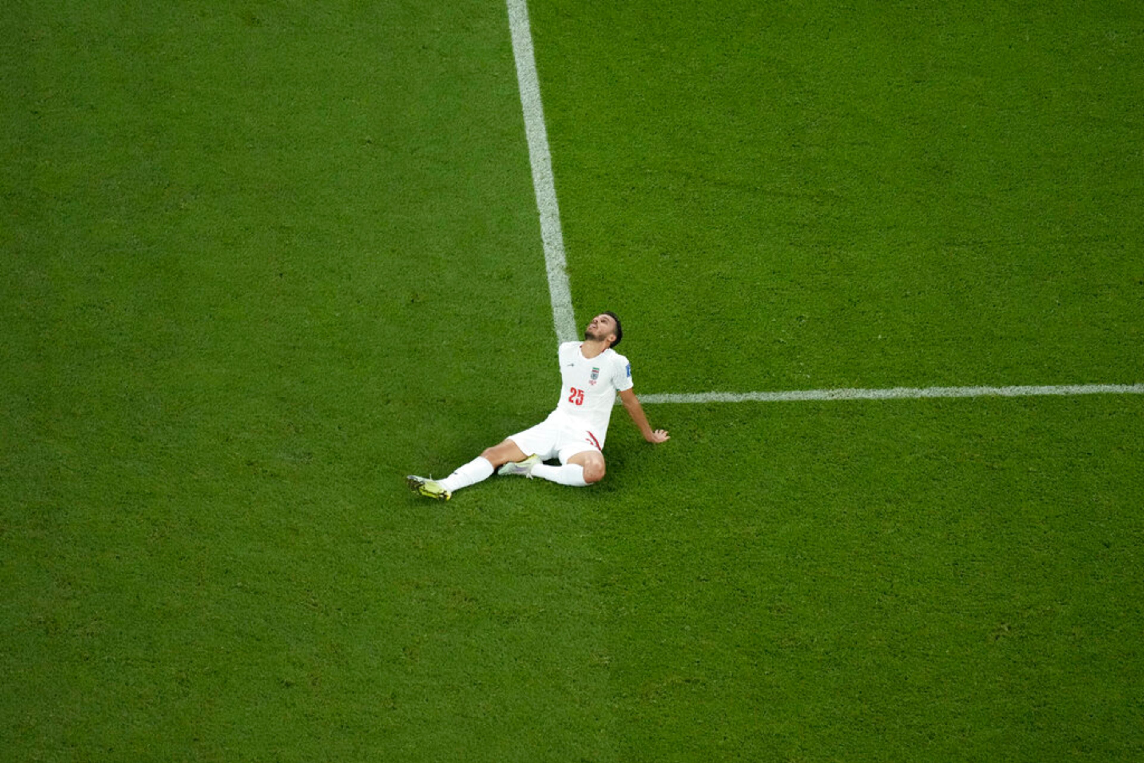 Iran's Abolfazi Jalali reacts at the end of the World Cup group B soccer match between Iran and the United States at the Al Thumama Stadium in Doha, Qatar, Wednesday, Nov. 30, 2022. The United States won 1-0 to the advance in the tournament. (AP Photo/Hassan Ammar)