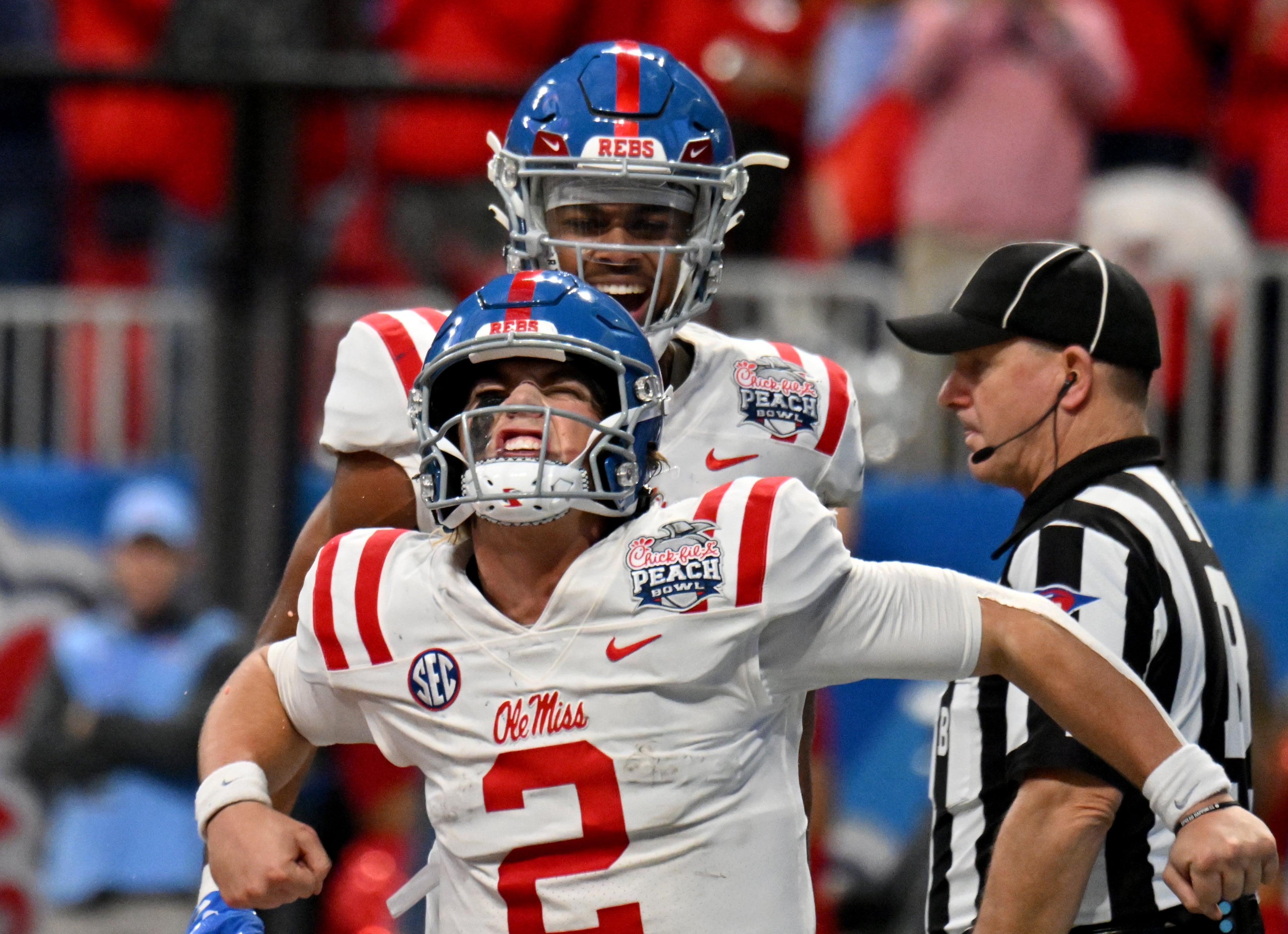 Ole Miss quarterback Jaxson Dart (2) reacts after scoring a touchdown during the fourth quarter in 2023 Chick-fil-A Peach Bowl at Mercedes-Benz Stadium, Saturday, December 30, 2023, in Atlanta. Ole Miss won 38-25 over Penn State. (Hyosub Shin / Hyosub.Shin@ajc.com)